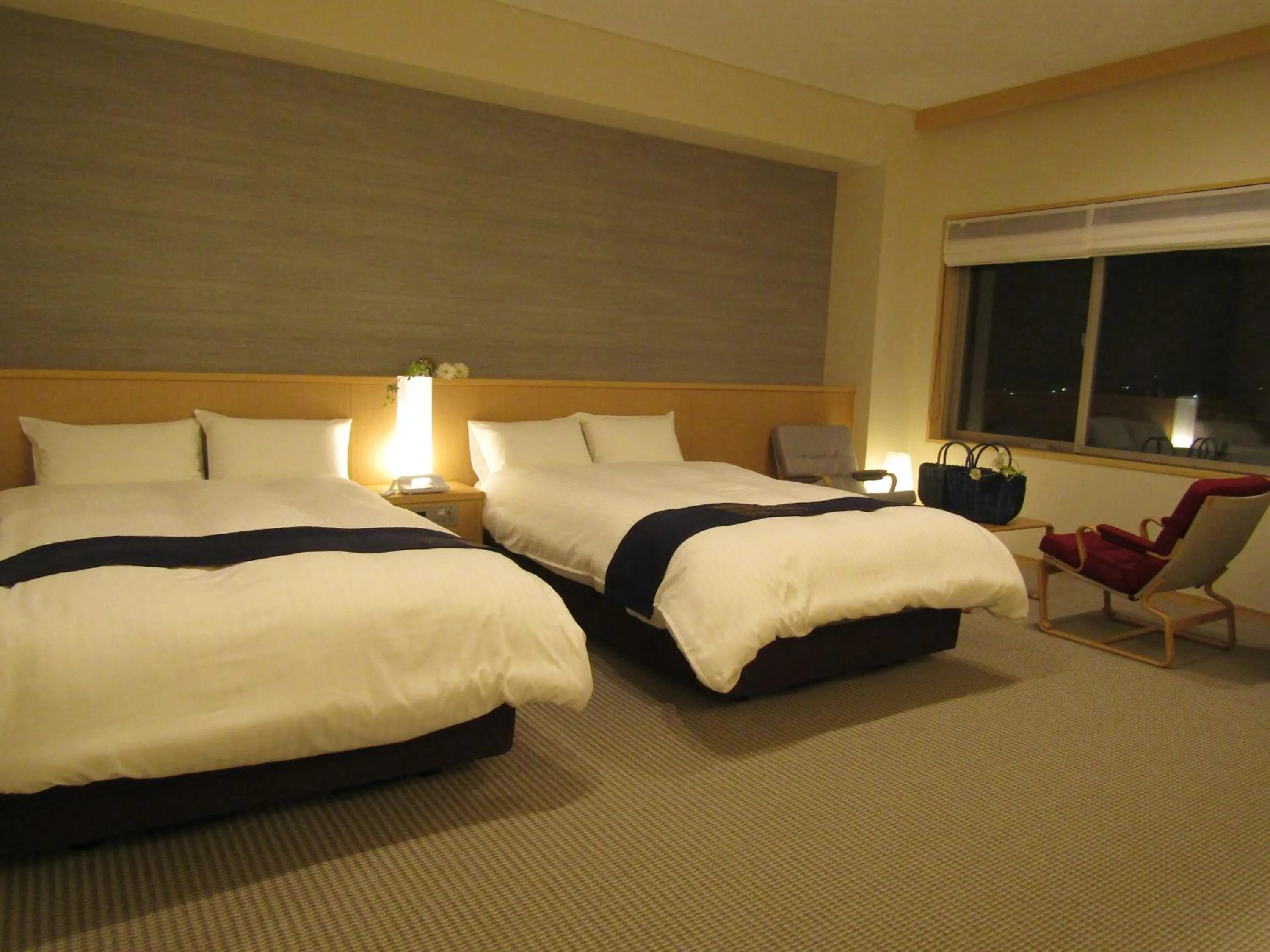 Living room, Bed in Japanese Style Hotel Isomura