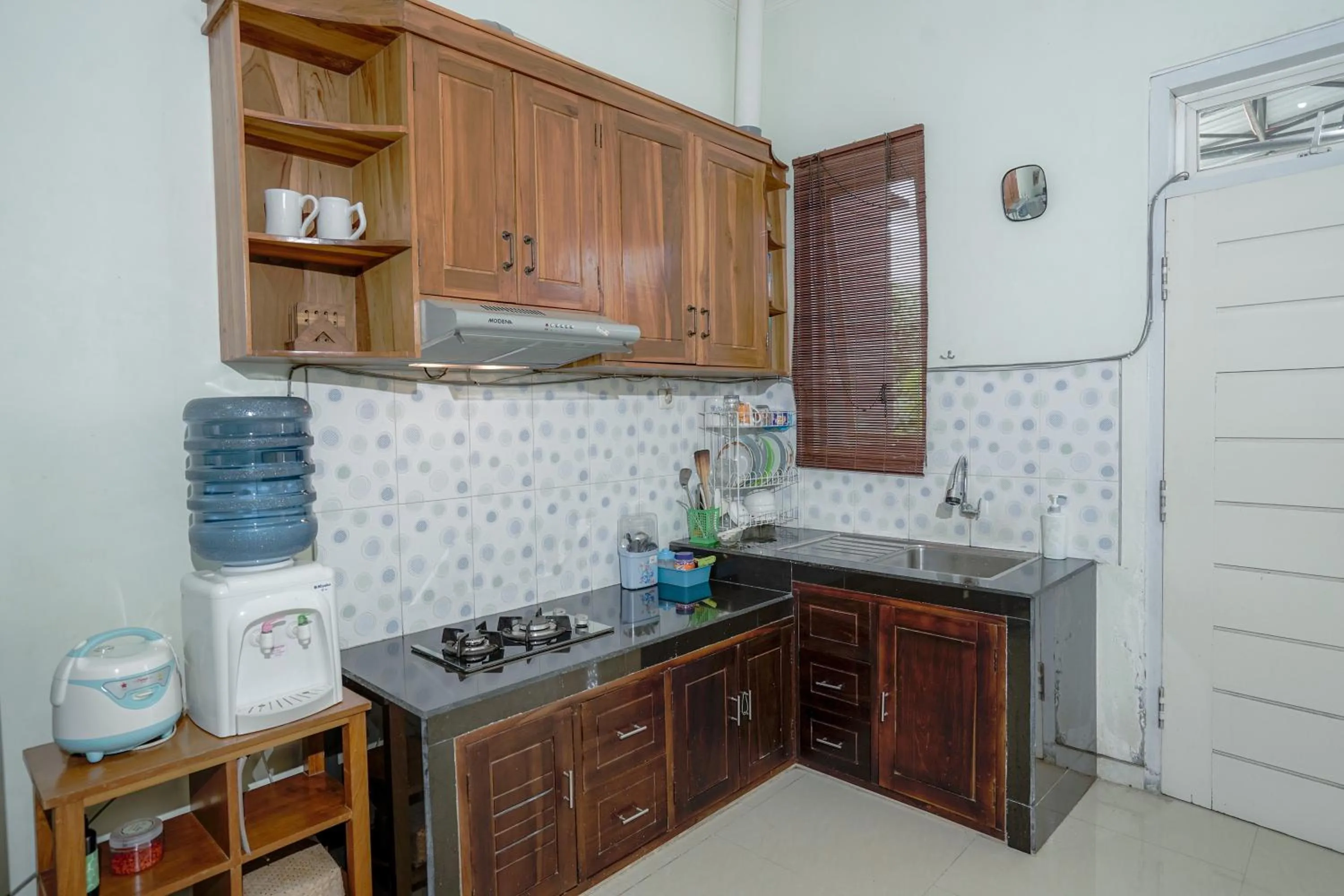 Kitchen or kitchenette in Sekar Gambir Homestay