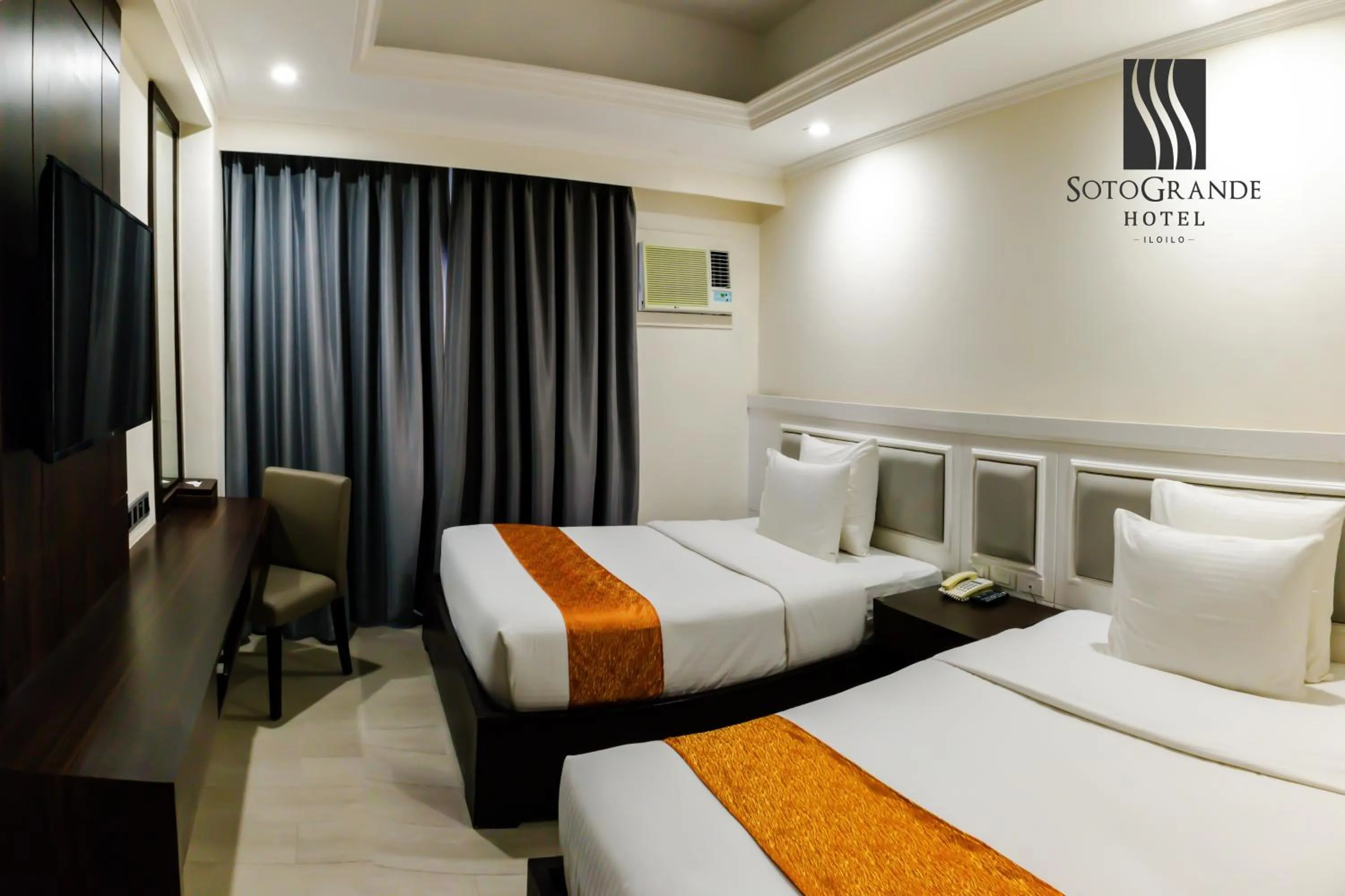 Bed in Sotogrande Iloilo Hotel