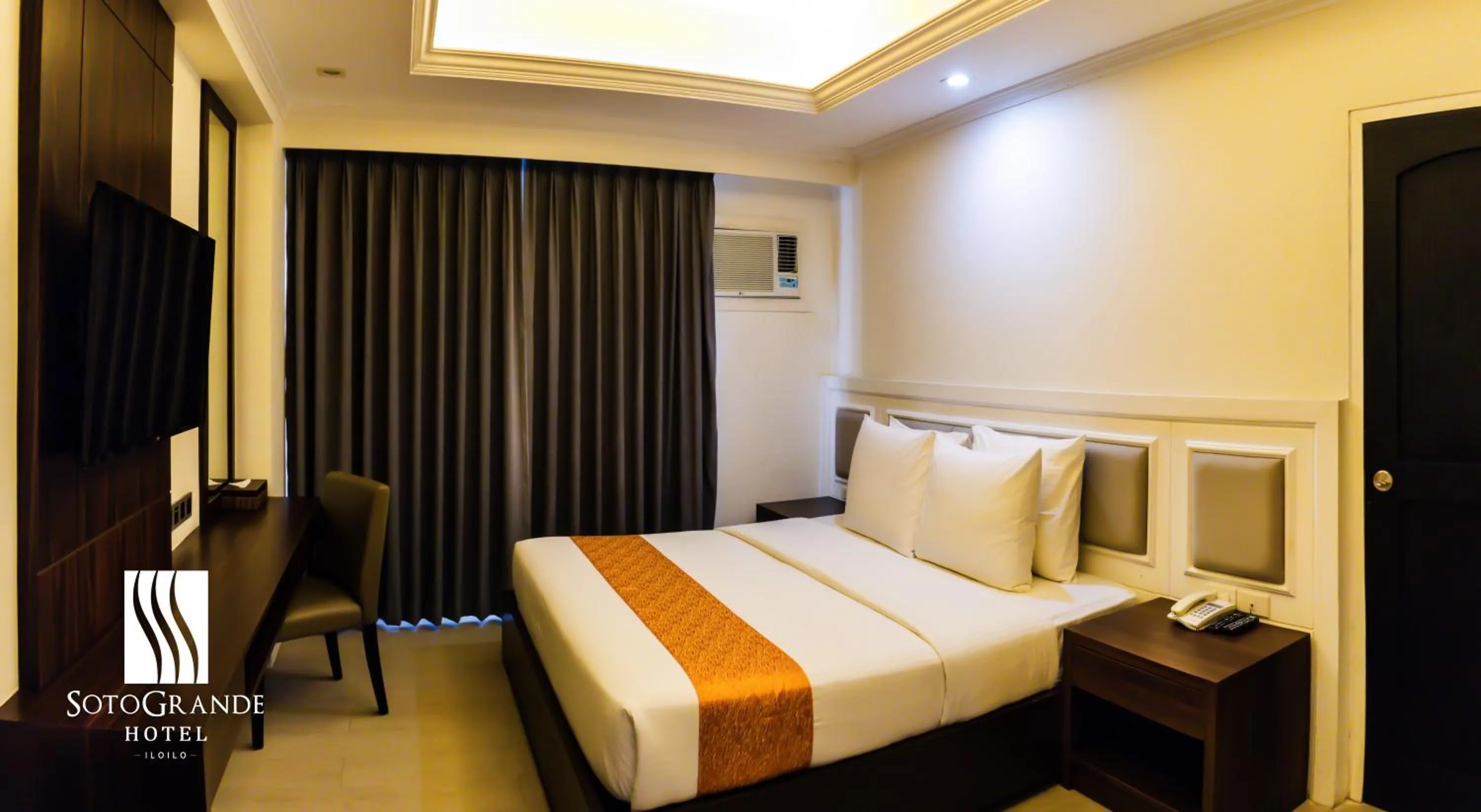 Bed in Sotogrande Iloilo Hotel