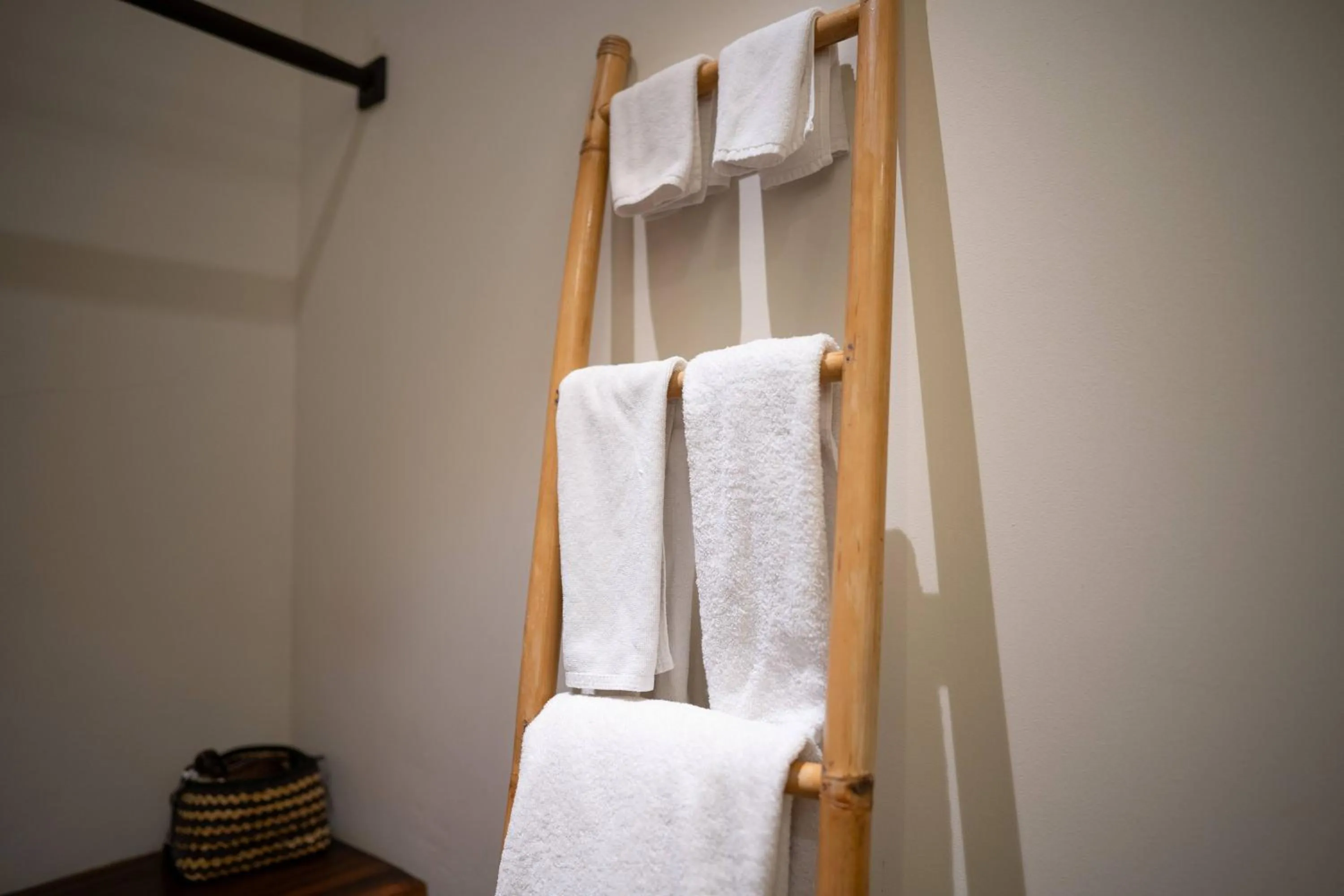 towels, Bed in Awan Putih Resort