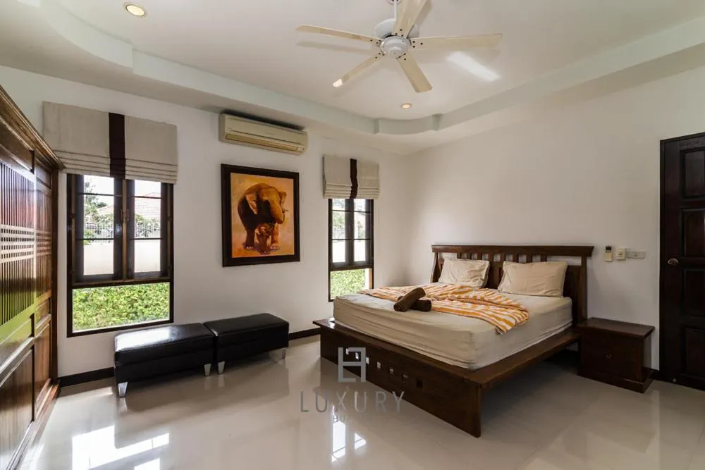 Bed in 4 Bedroom Private Bali Style Villa HH6