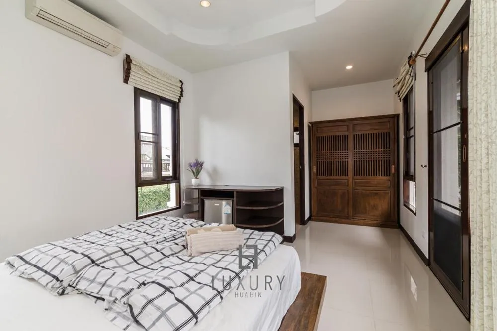 Bed in 4 Bedroom Private Bali Style Villa HH6