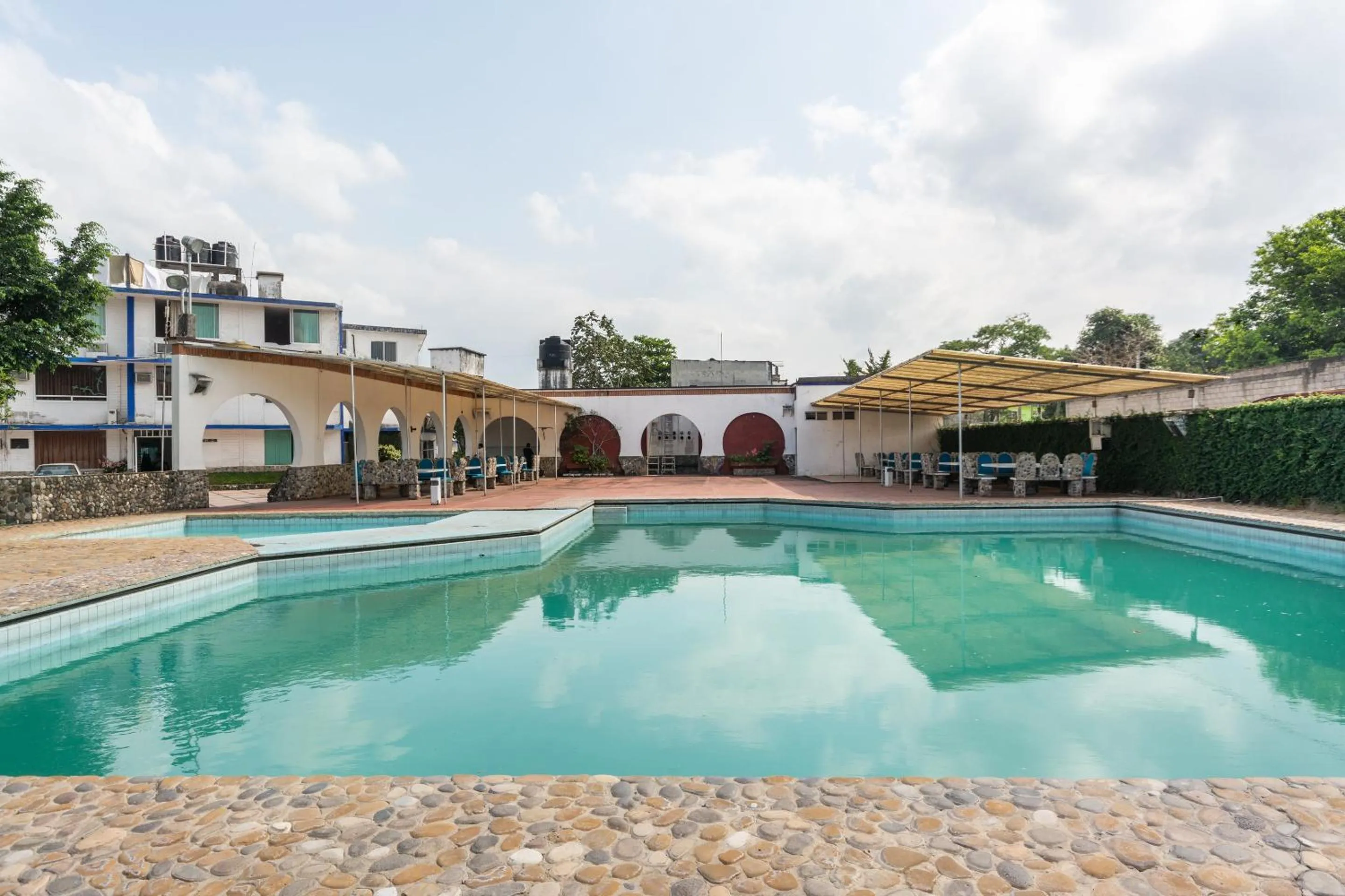 Swimming pool in OYO Hotel Casa Blanca