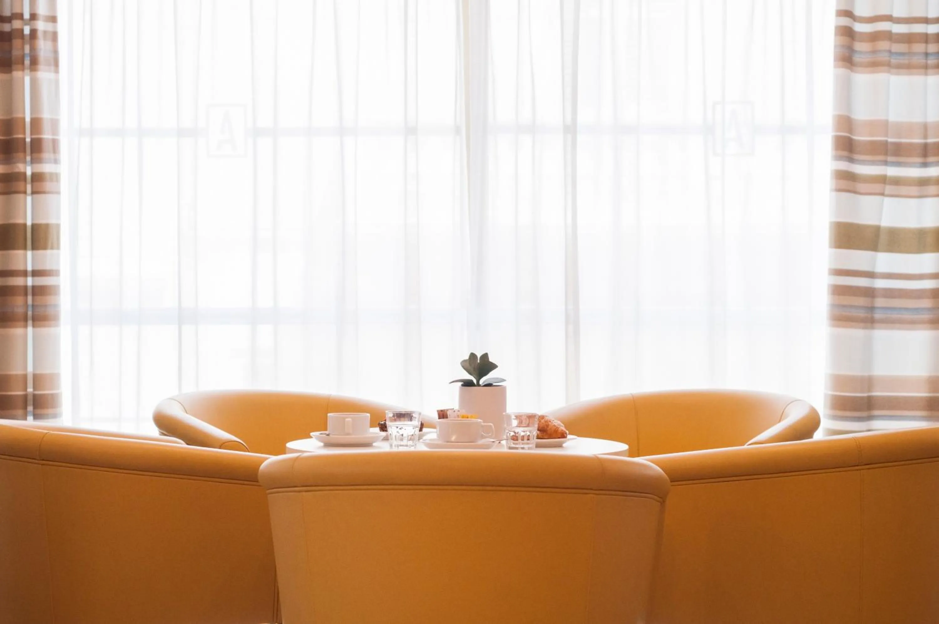 Lounge or bar in ROOMS by Alexandra Hotel