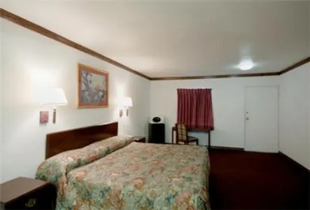 Bed in Executive Inn Muldrow