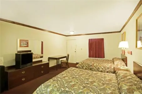 Bed in Executive Inn Muldrow