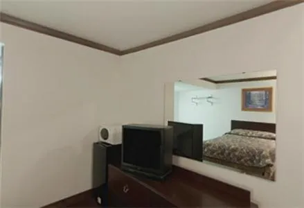 Bed in Executive Inn Muldrow