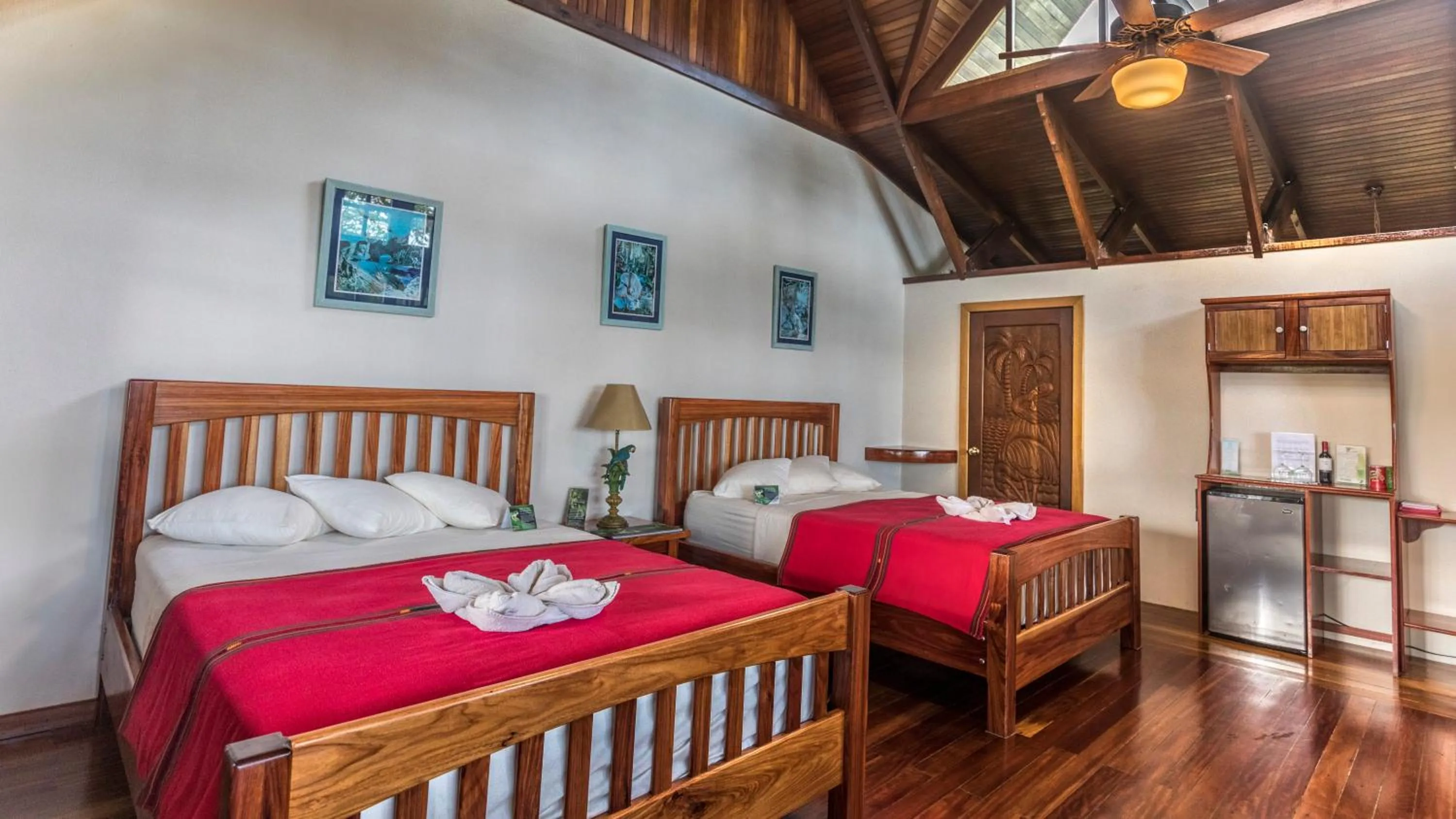 Bed in Aguila de Osa Rainforest Lodge