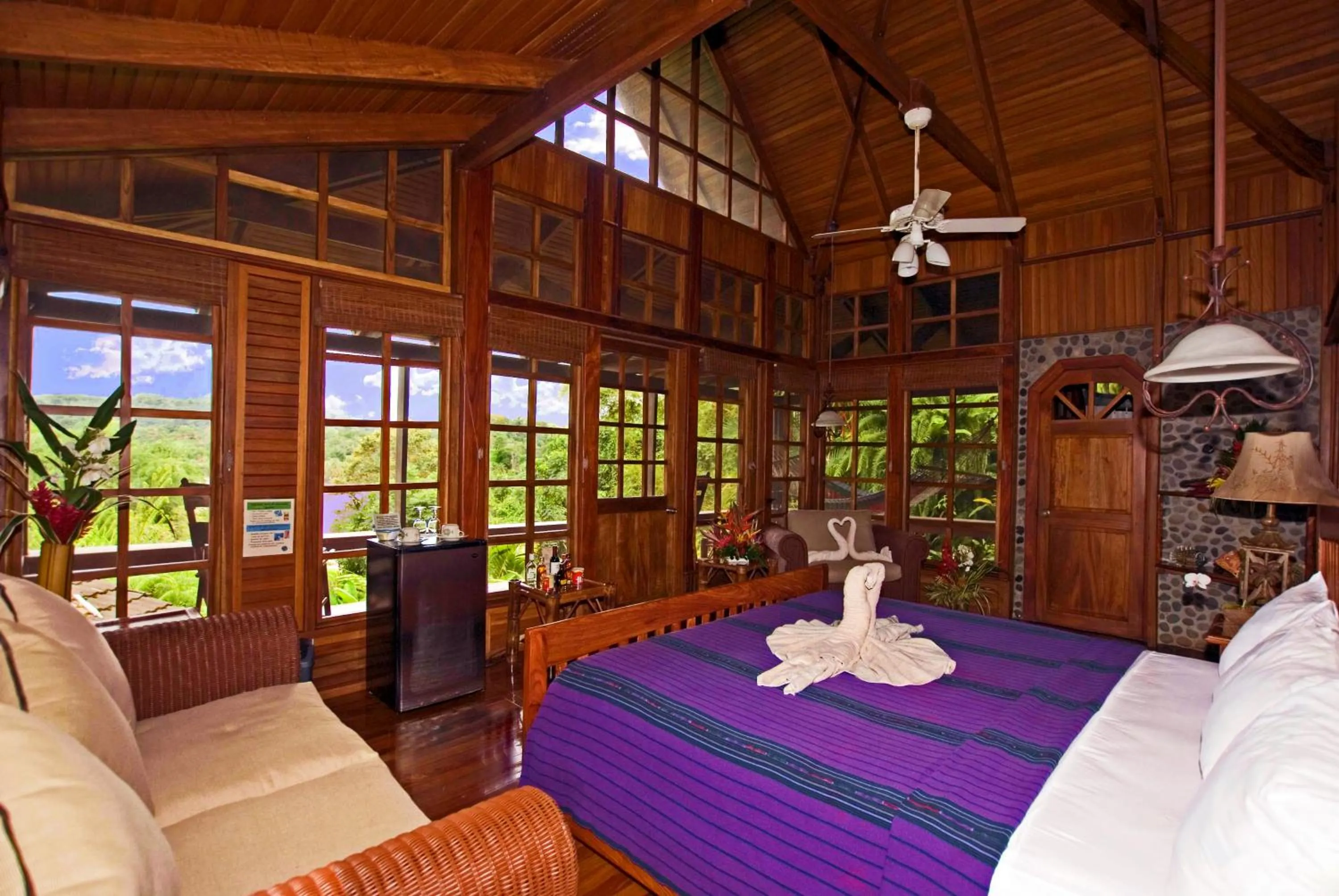 Bed in Aguila de Osa Rainforest Lodge