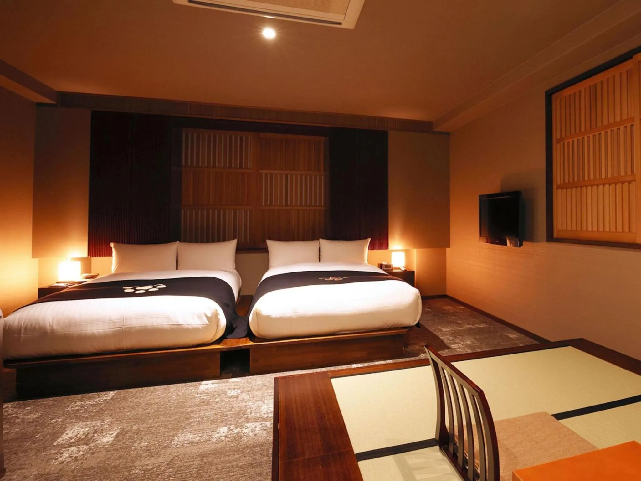 Photo of the whole room, Bed in Ryotei Matsuya Honkan Suizenji