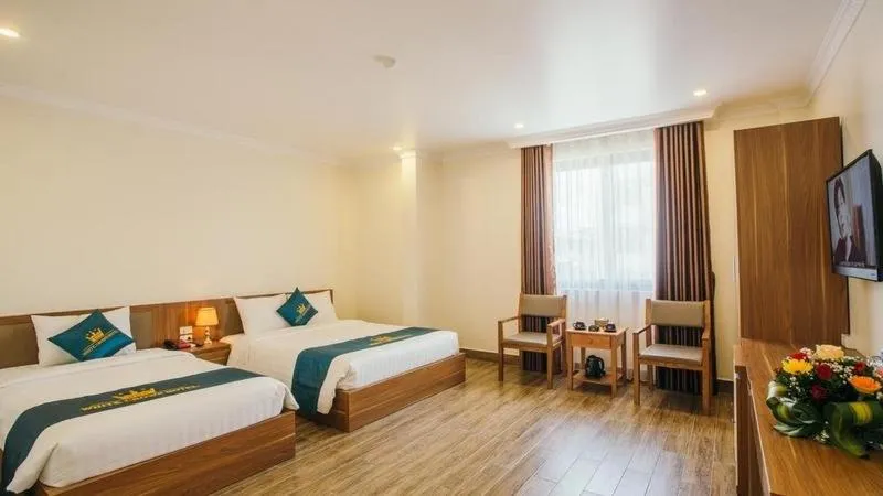 Bed in White Crown Hotel