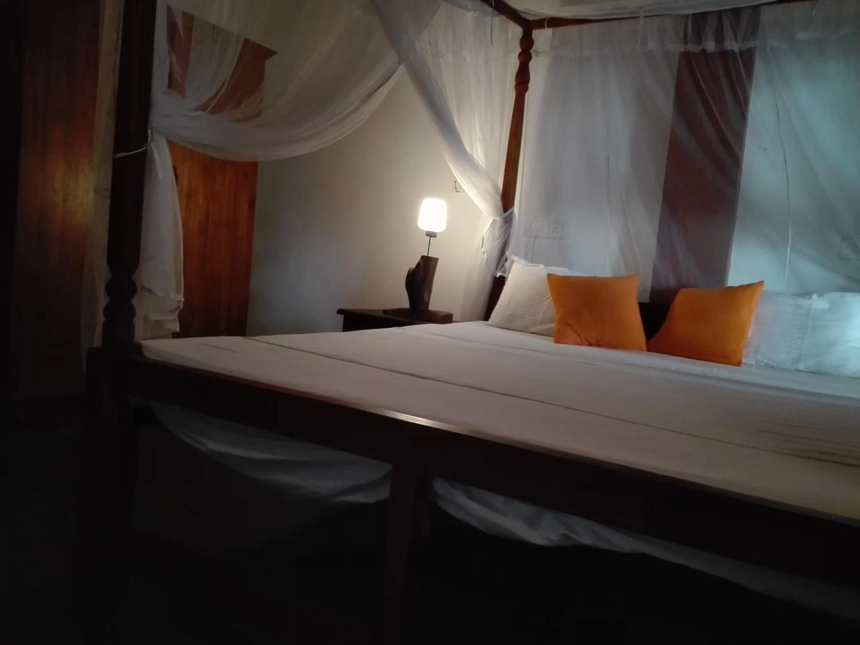 Bed in Sunset Colony Beach Resort