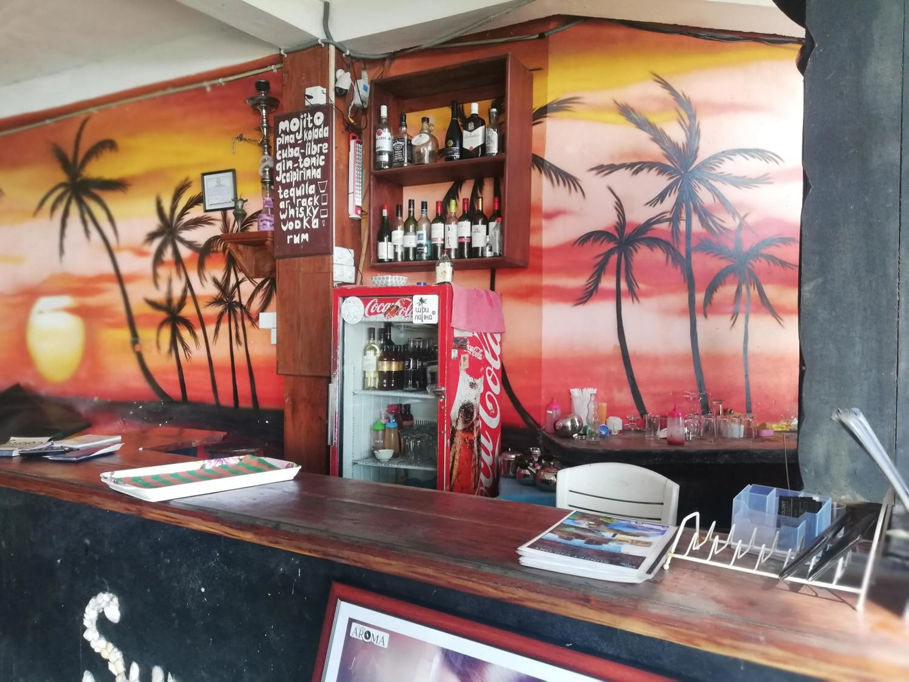 Lounge or bar in Sunset Colony Beach Resort