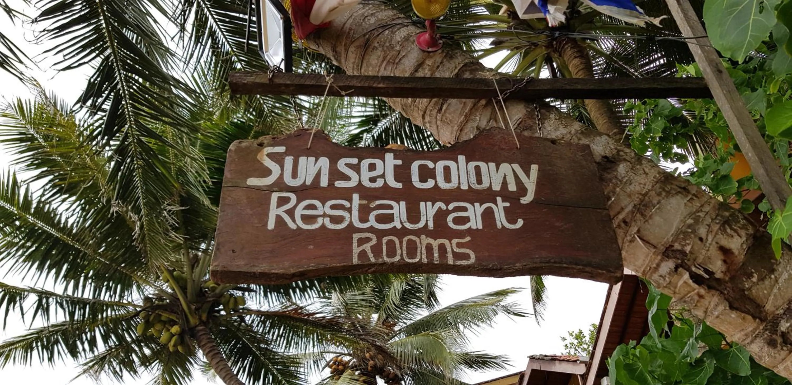 Property logo or sign in Sunset Colony Beach Resort