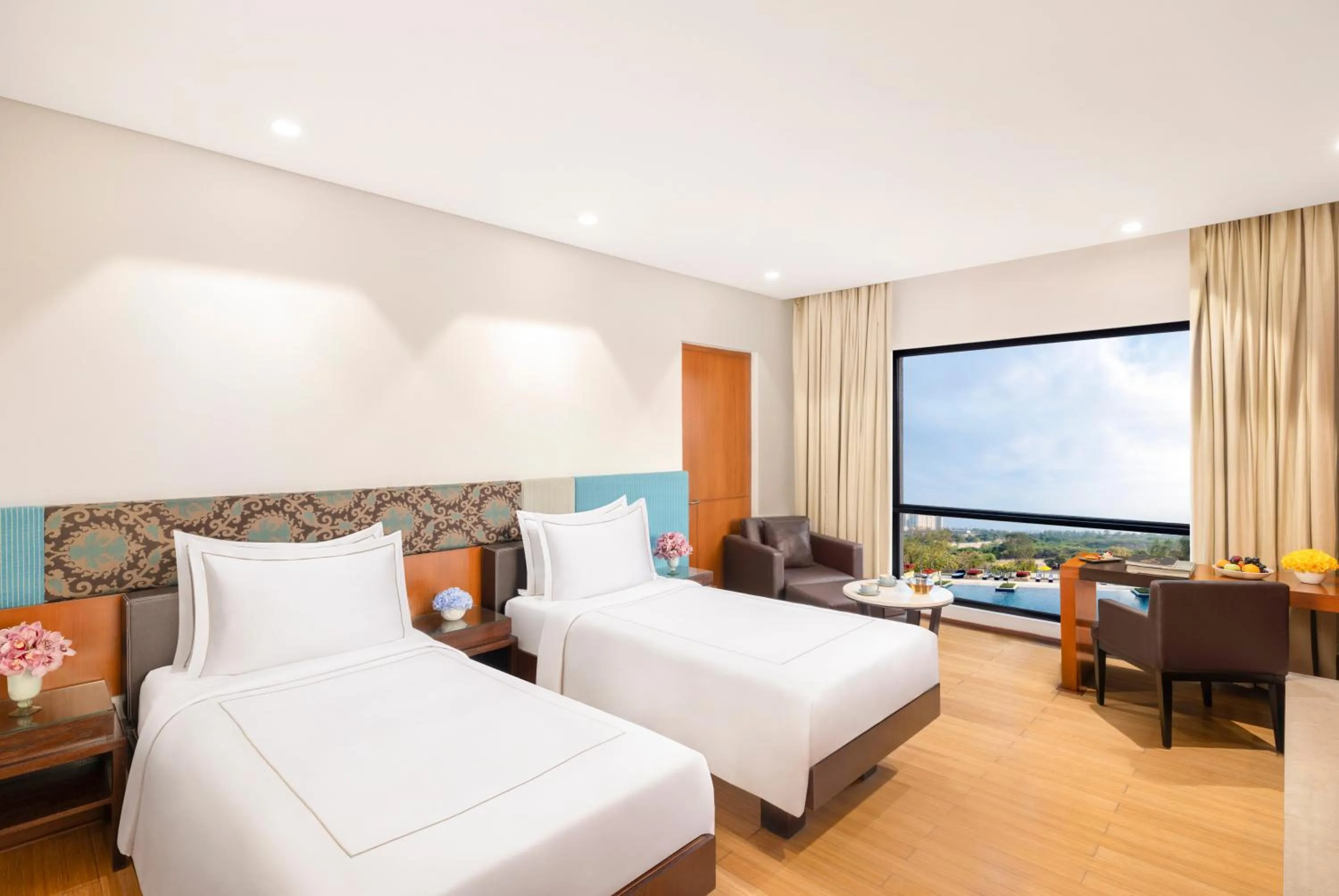 Bed in Taj Surajkund Resort & Spa, Delhi NCR