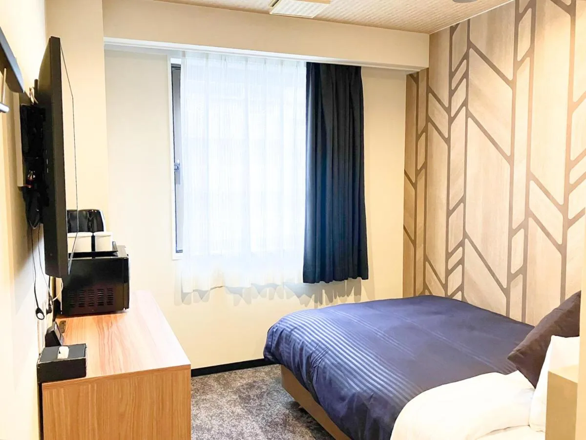 Bed in HOTEL LiVEMAX BUDGET Chofu-Ekimae