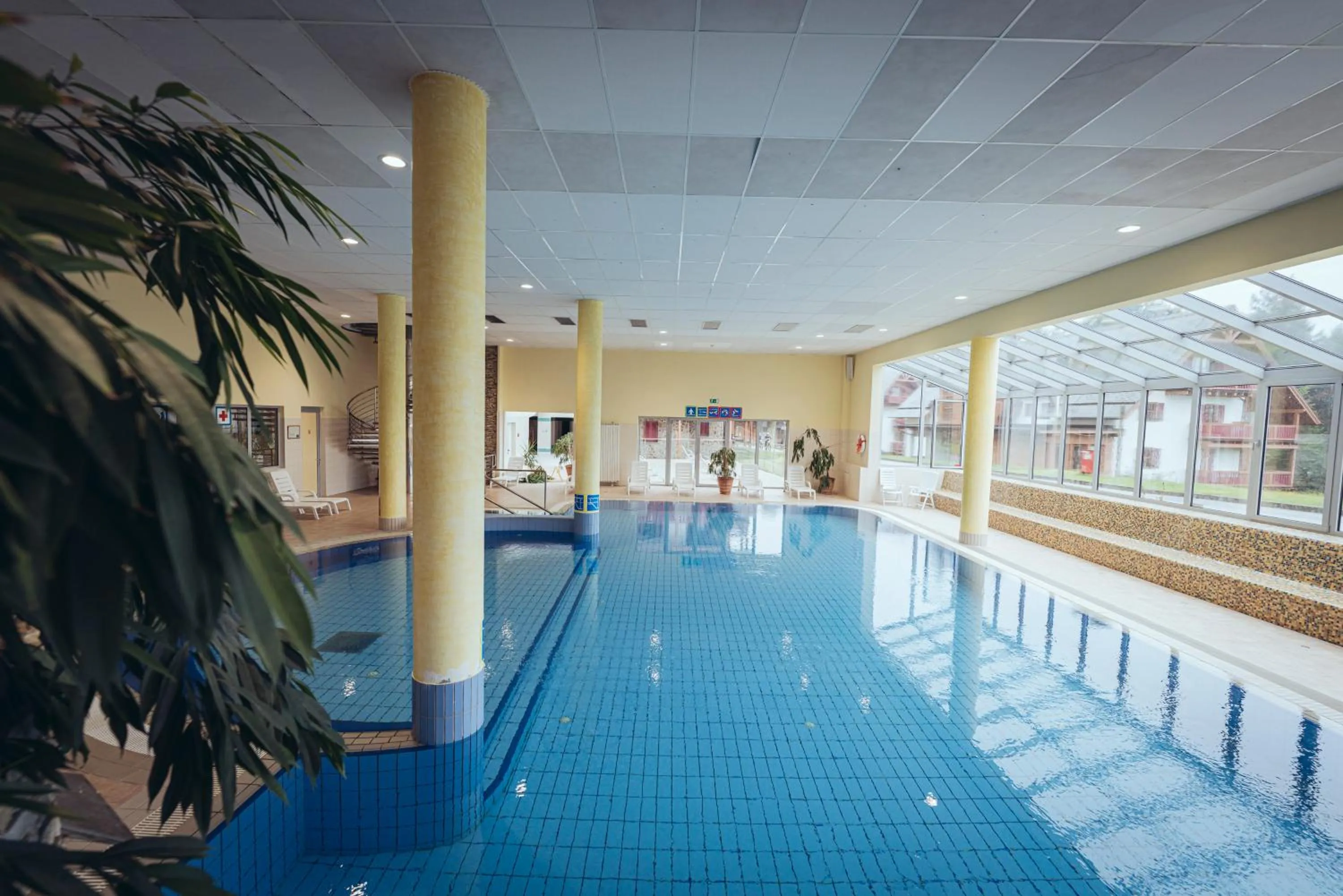 Swimming pool in Pohorje Village Wellbeing Resort - Wellness & Spa Hotel Bolfenk
