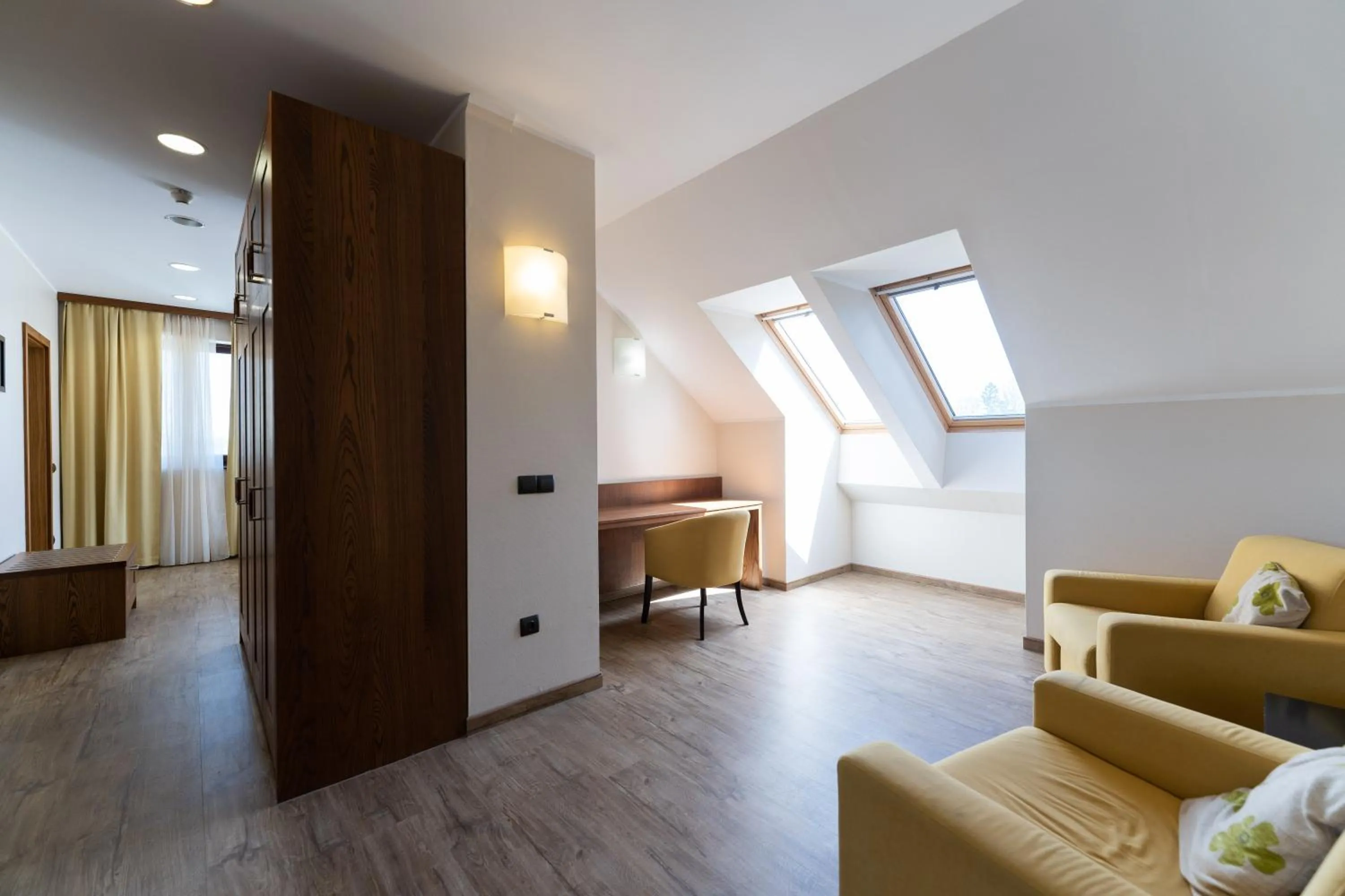 Living room, Bed in Hotel Arena Maribor