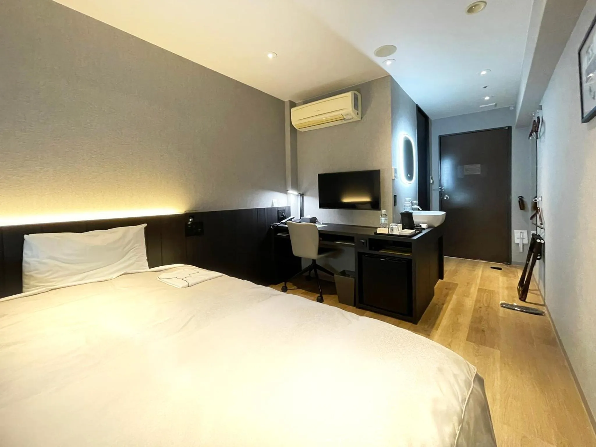 Bed in Hotel Sunroute Kumamoto