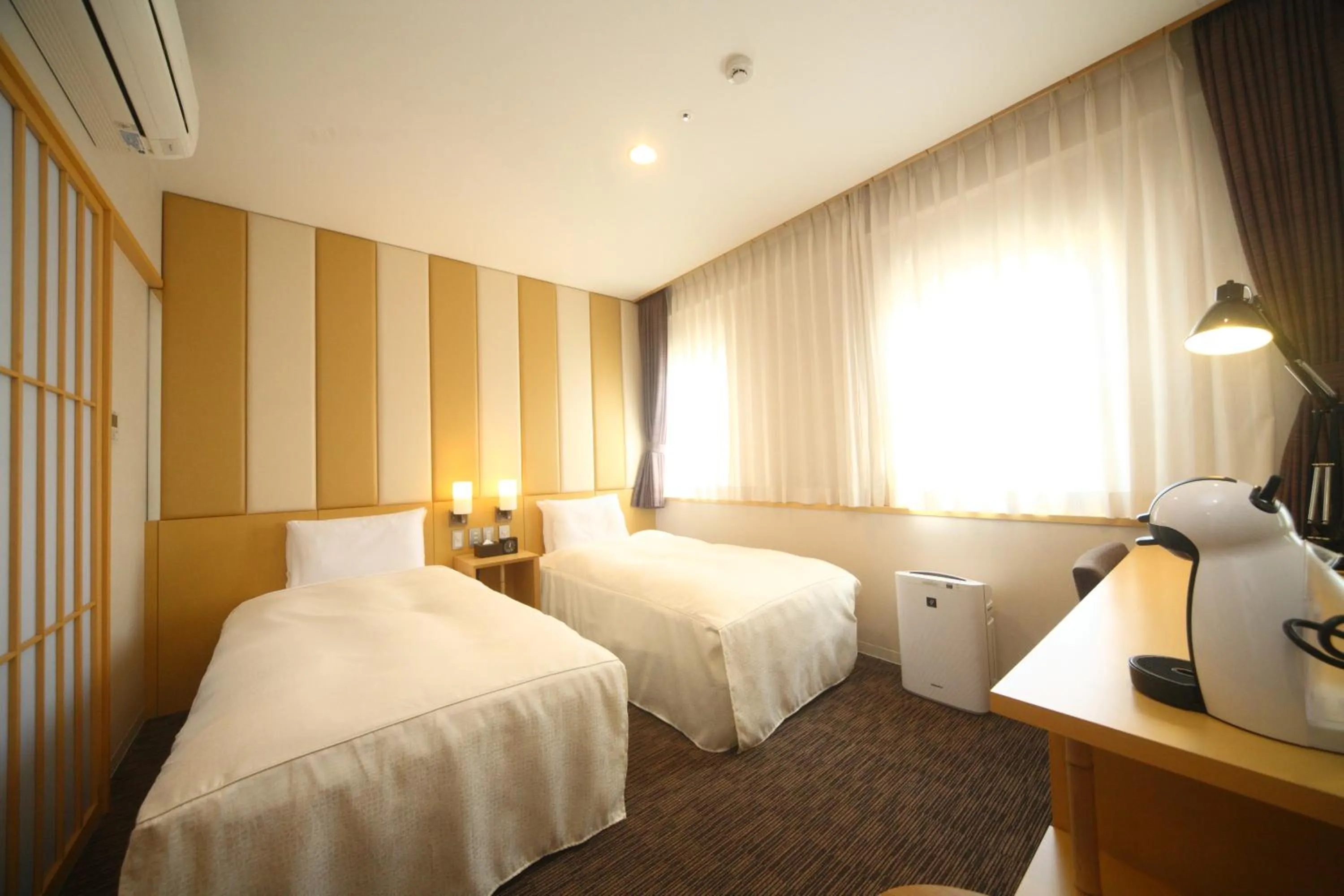 Bed in Hotel Sunroute Kumamoto