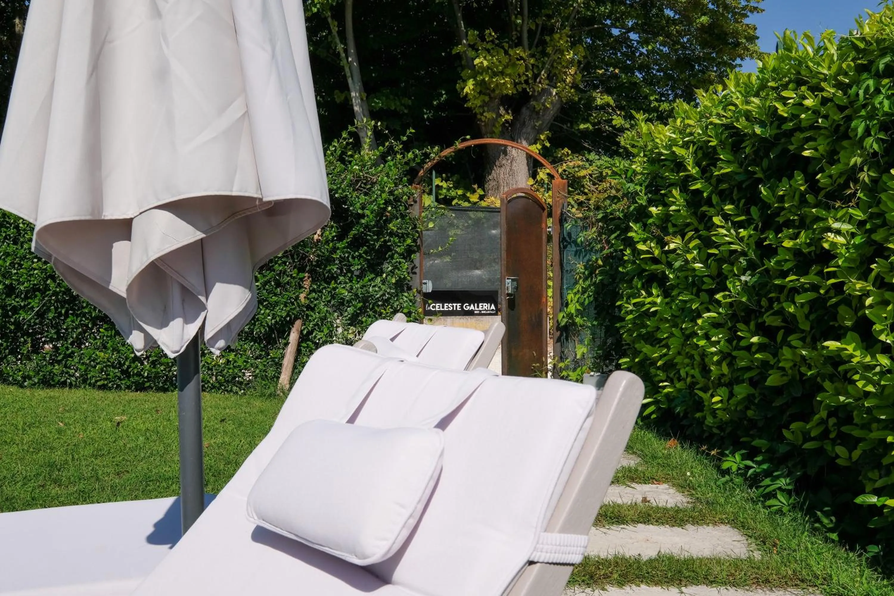 Property logo or sign in La Celeste Galeria