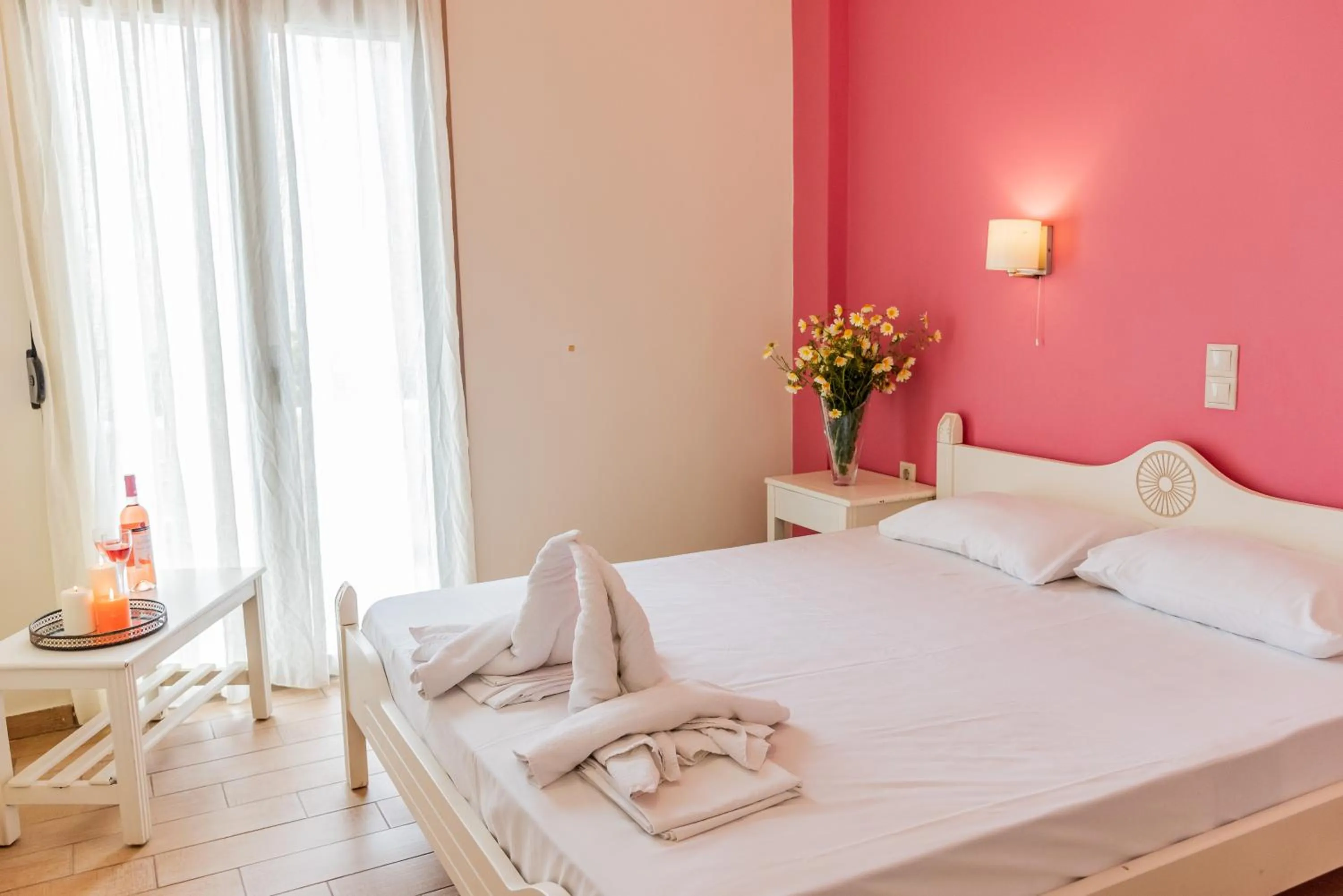 Bed in Almyra Apartments & Suites