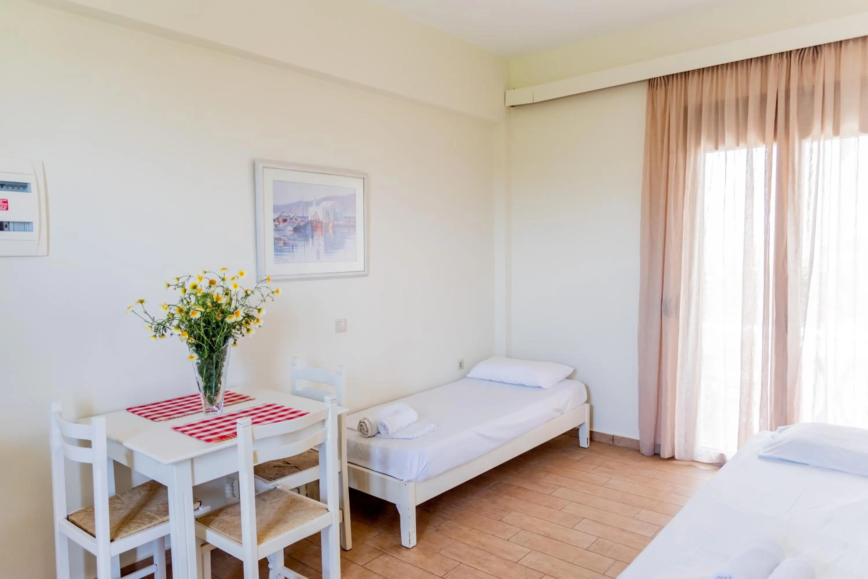 Living room, Bed in Almyra Apartments & Suites