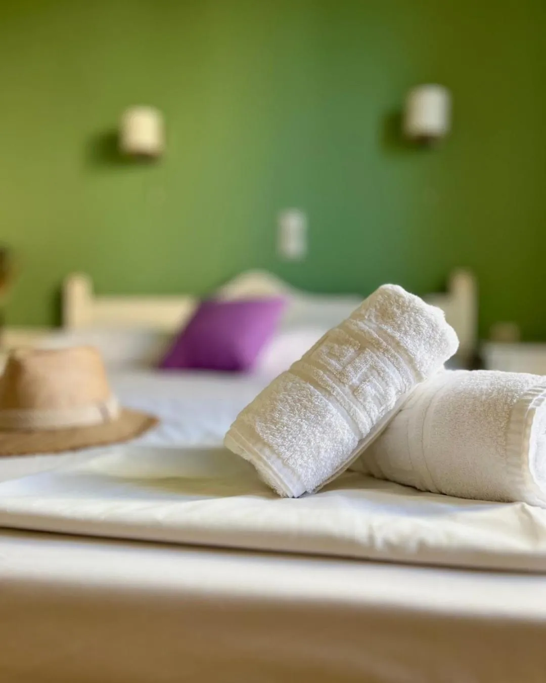 Bed in Almyra Apartments & Suites