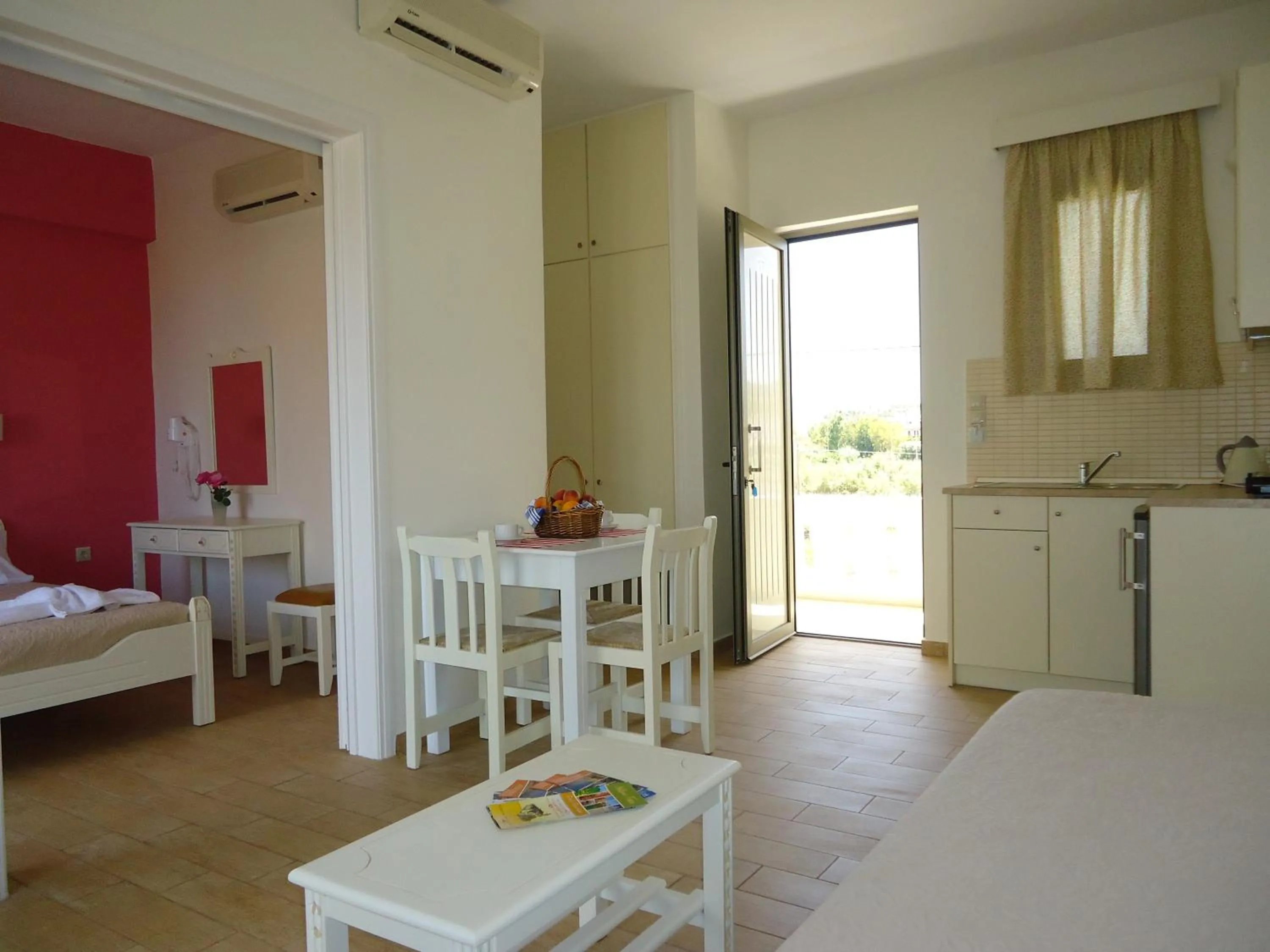 Living room, Bed in Almyra Apartments & Suites