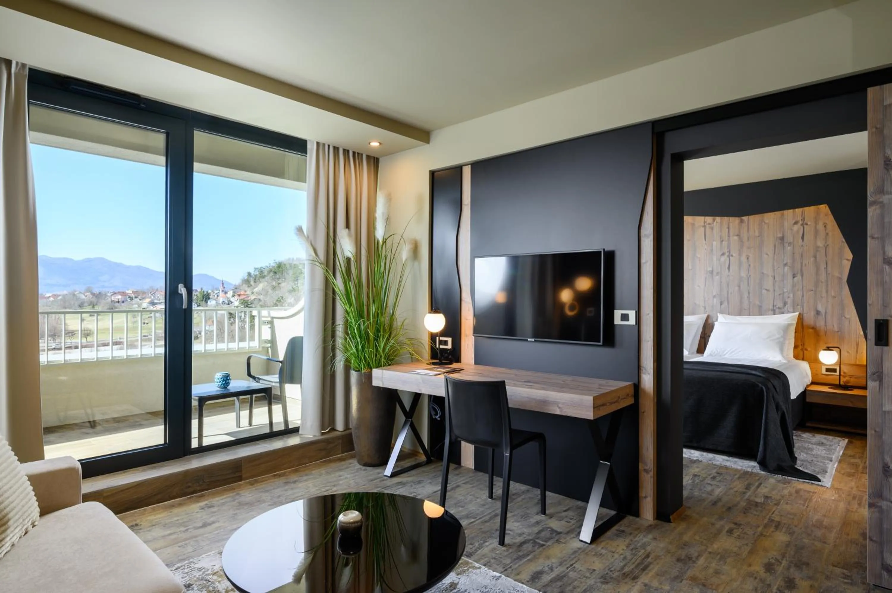 Living room, Bed in Postojna Cave Hotel Jama