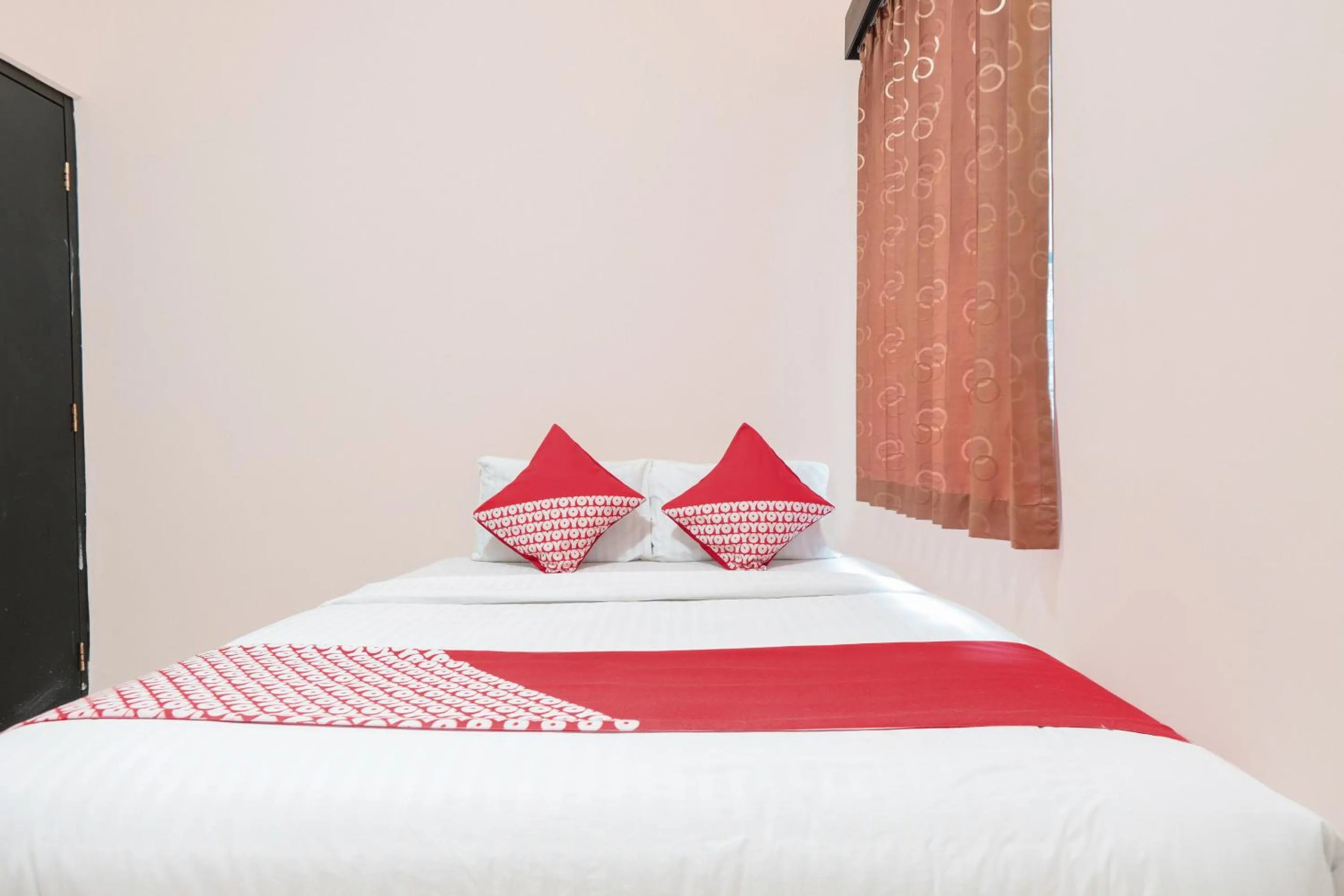 Bedroom in OYO 122 Oekude Kost