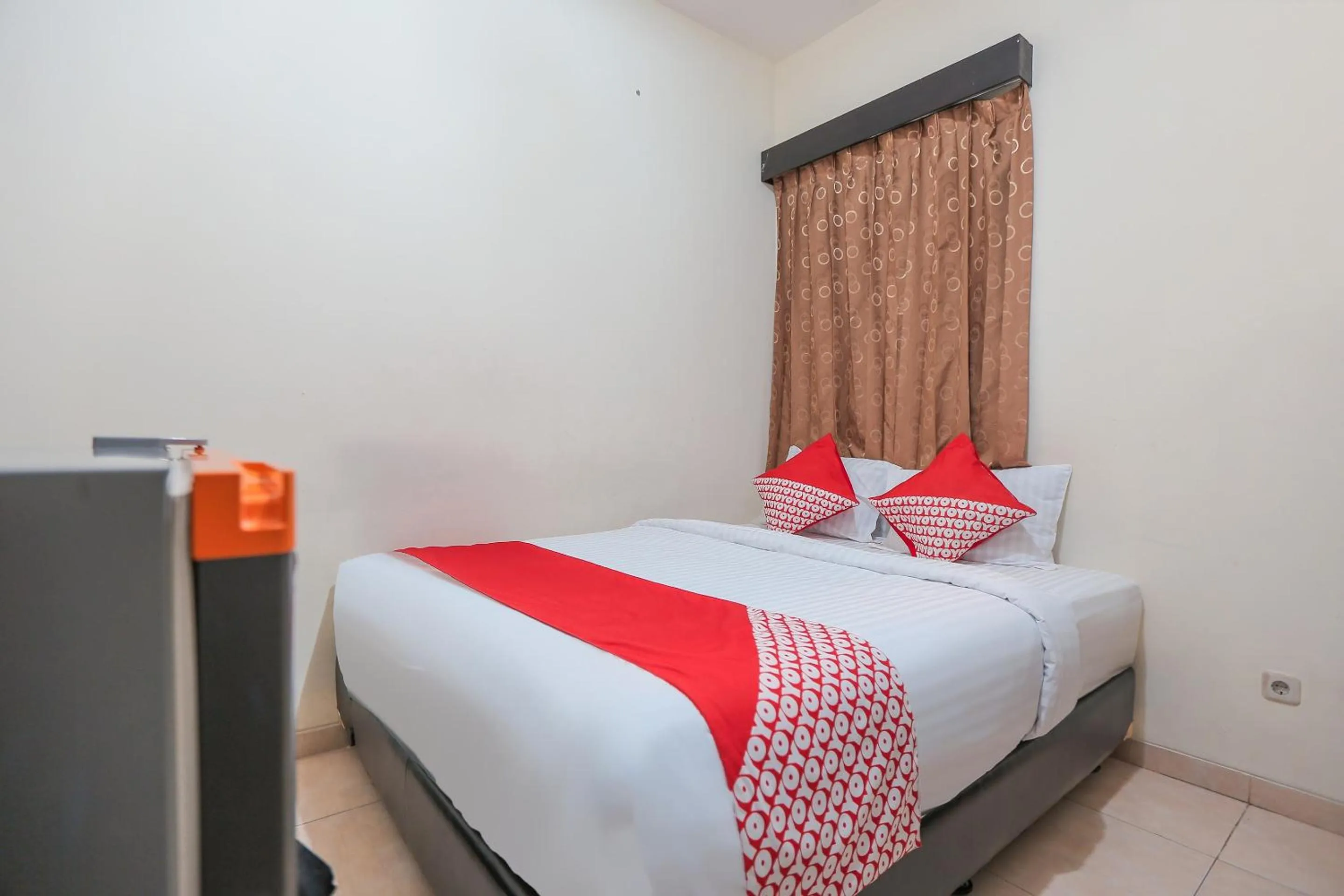 Bedroom in OYO 122 Oekude Kost