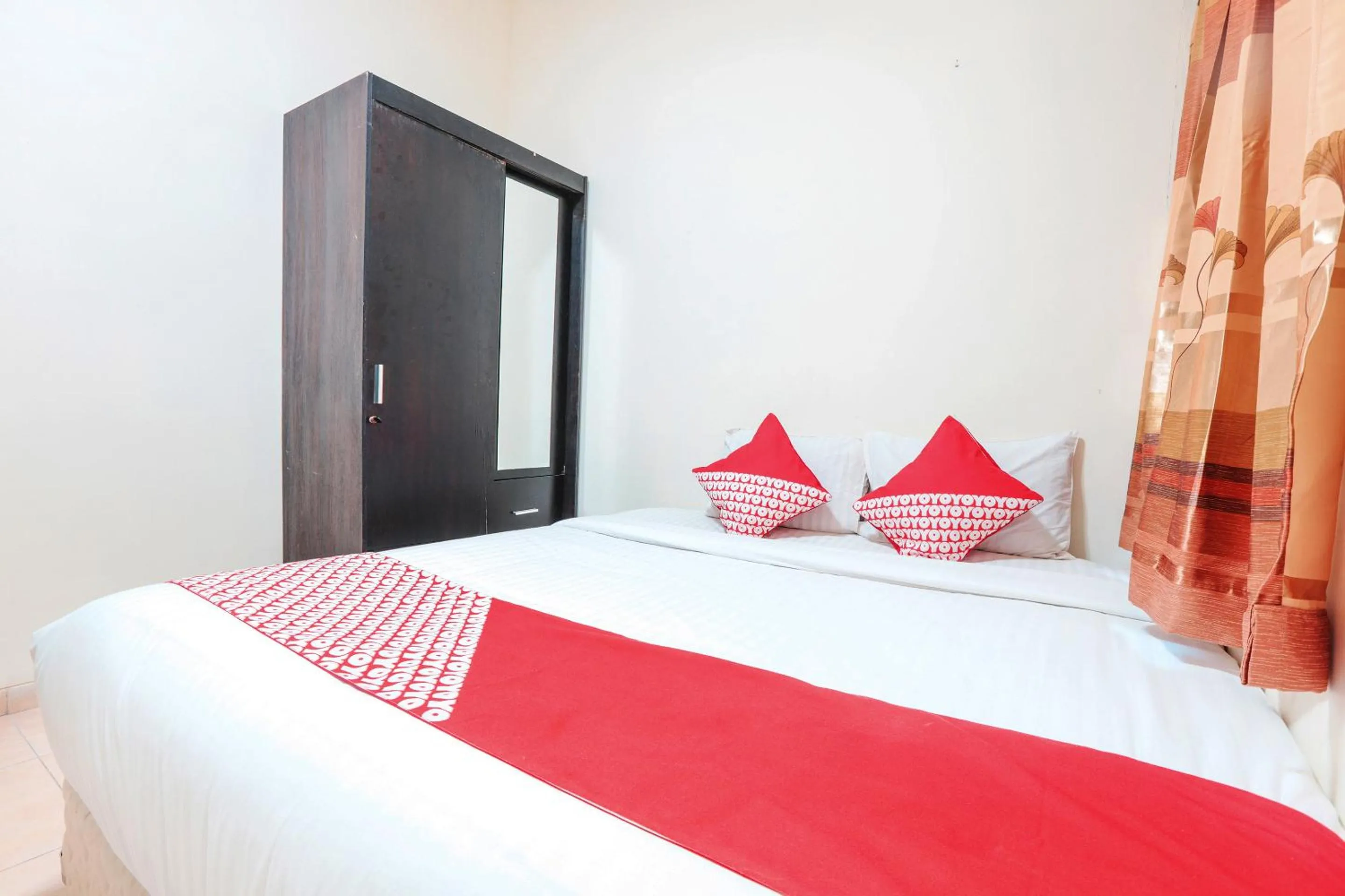 Bedroom in OYO 122 Oekude Kost