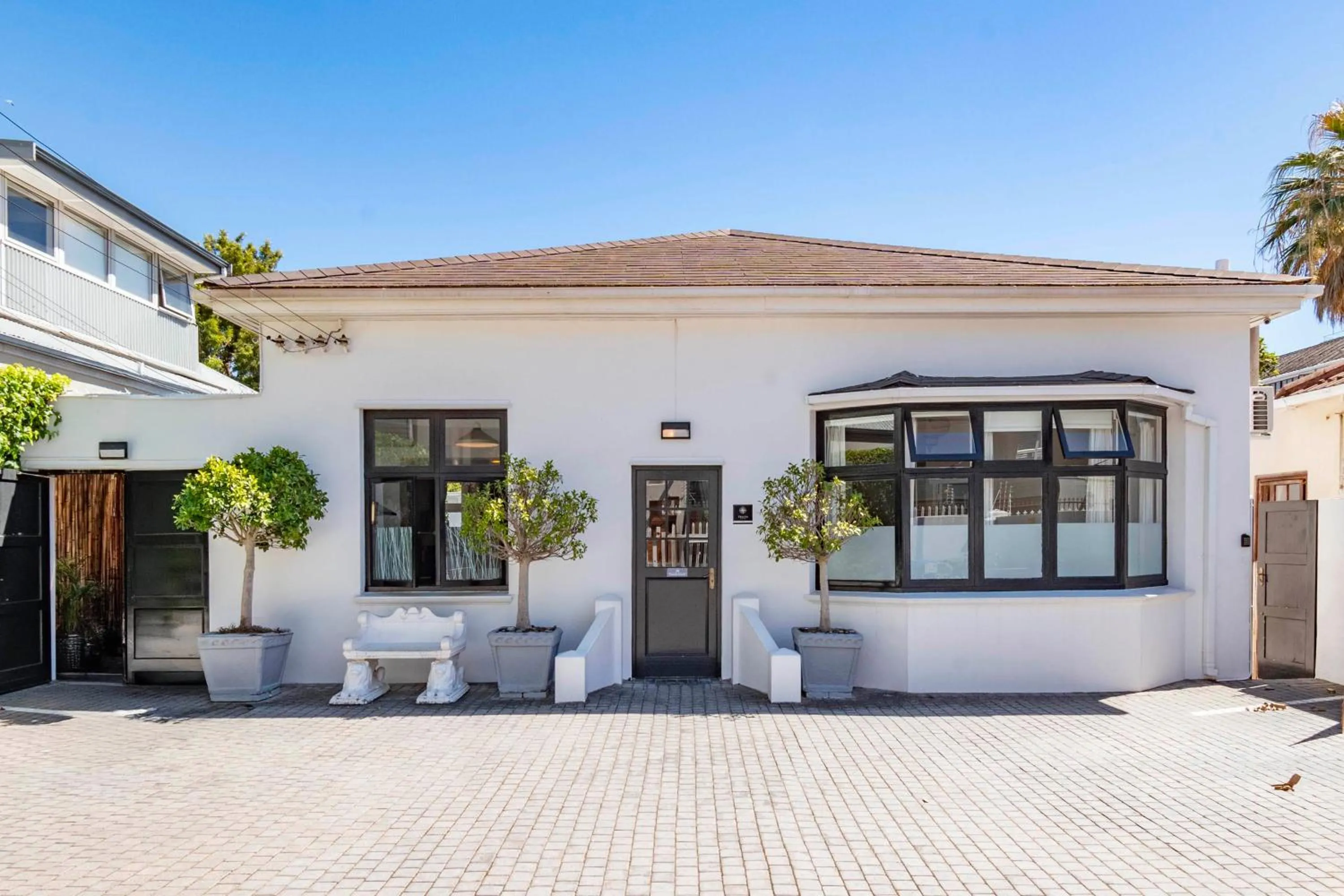 Property building in Antrim Villa by Antrim Collection