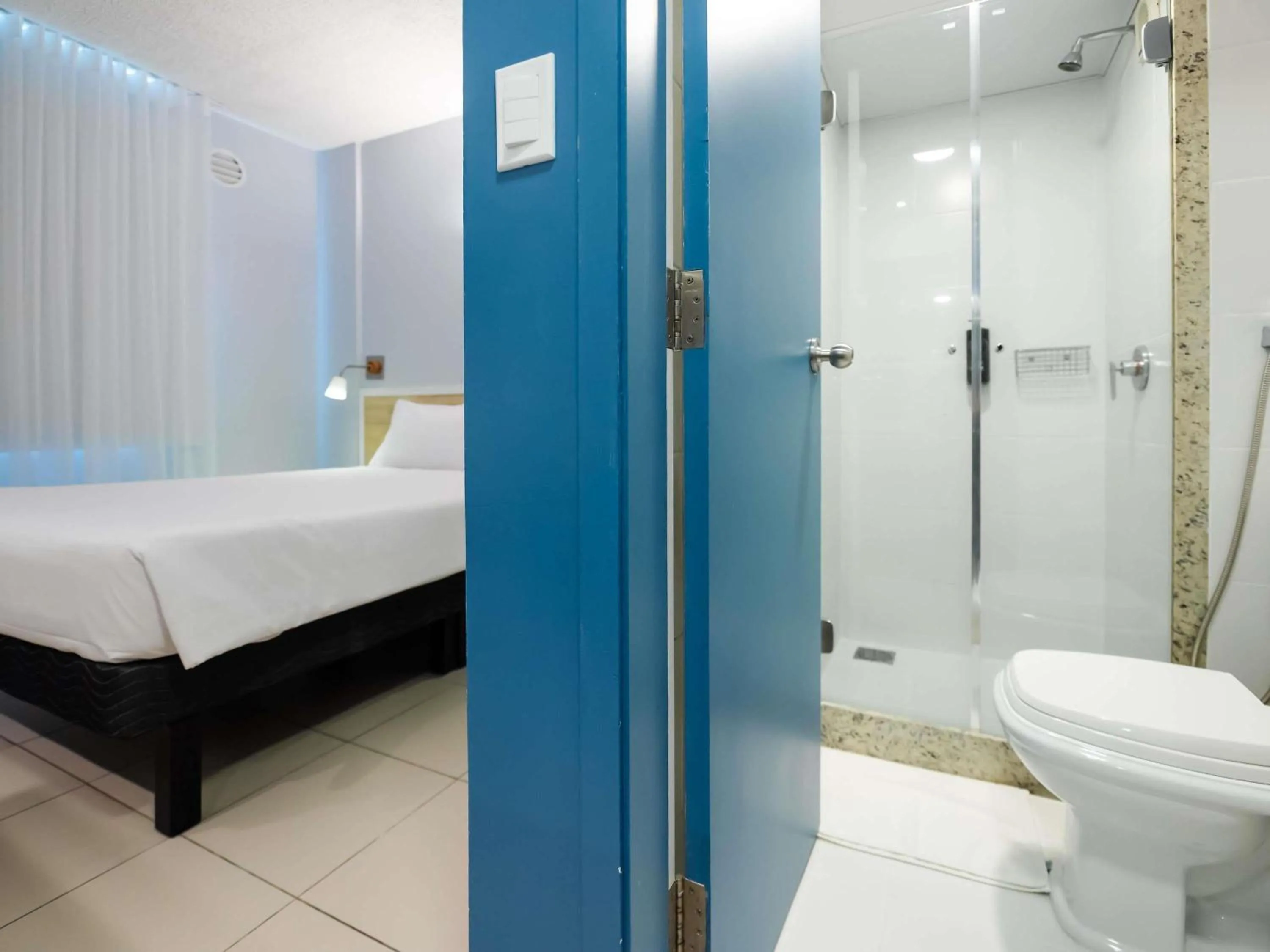 Bedroom in ibis Styles Manaus