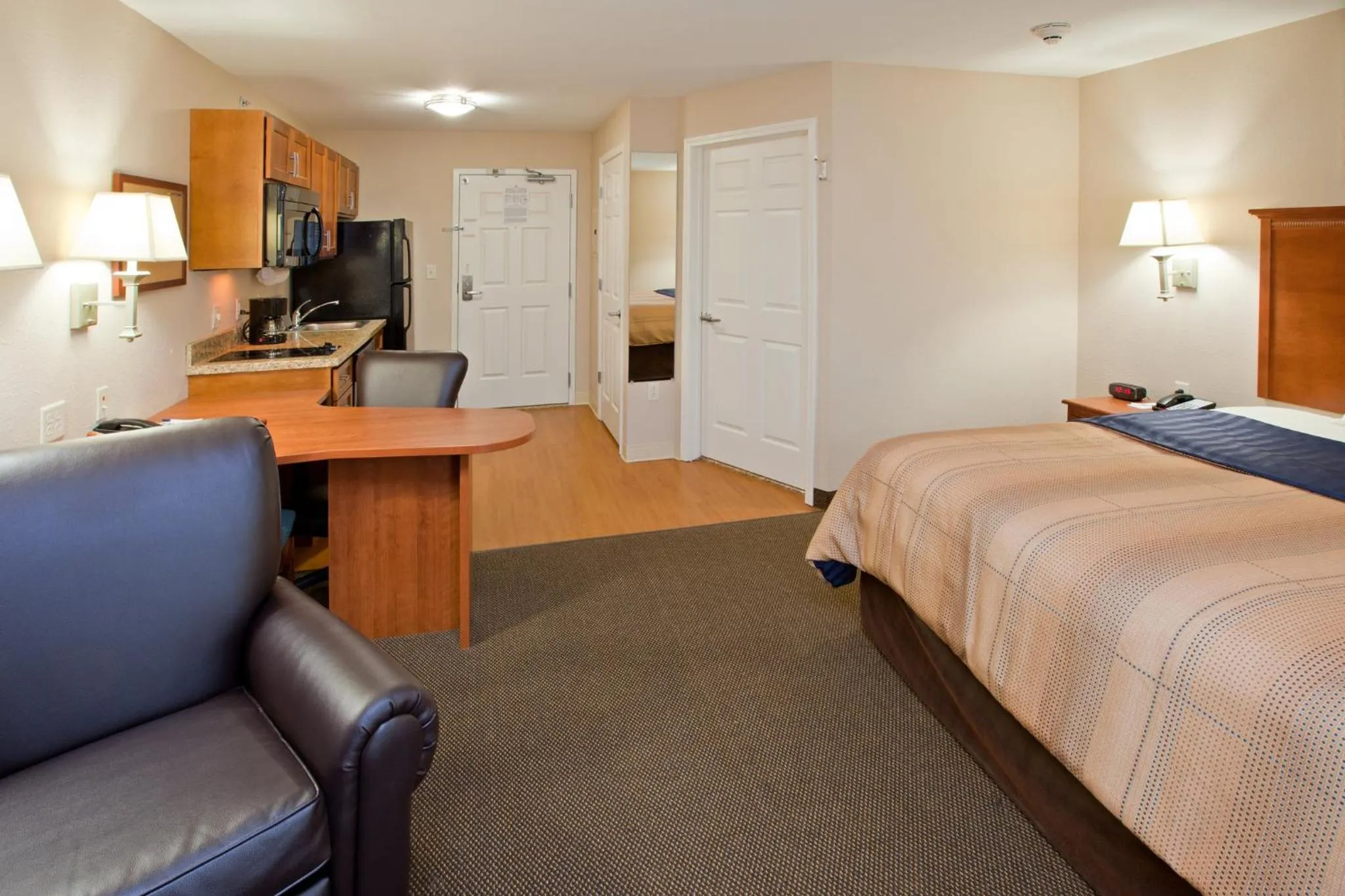 Photo of the whole room, Bed in Candlewood Suites Indianapolis East by IHG