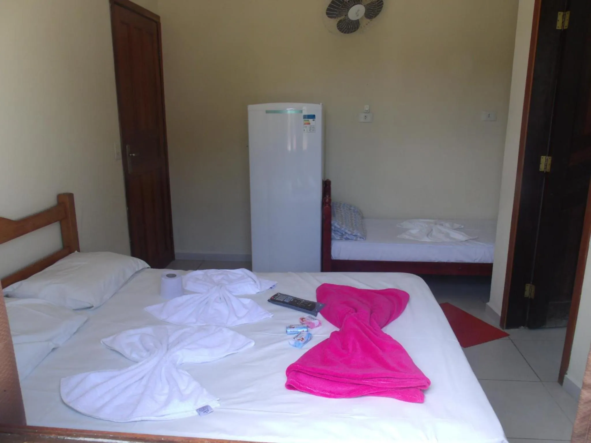 Bed in Pousada Edson