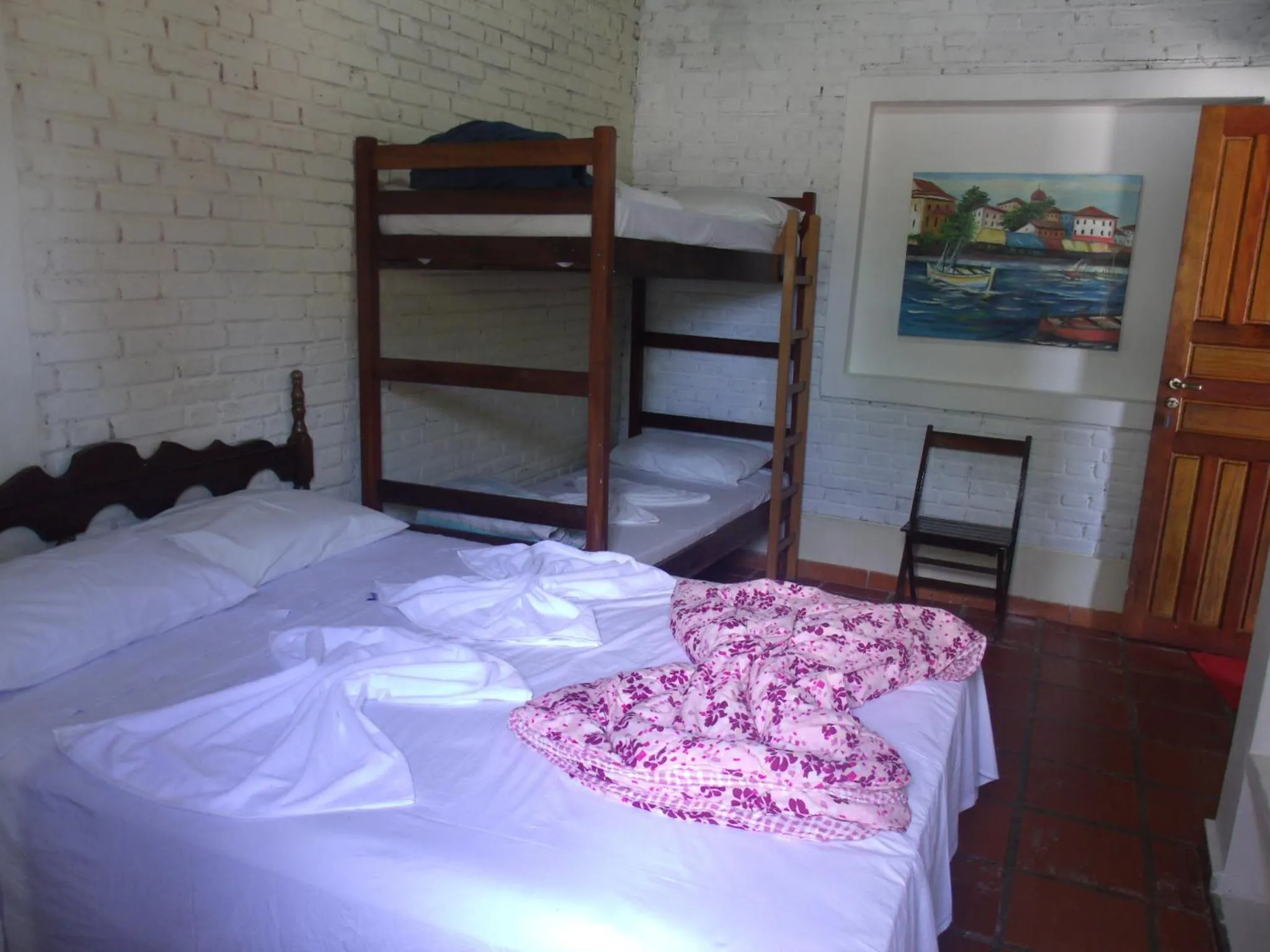Bed in Pousada Edson