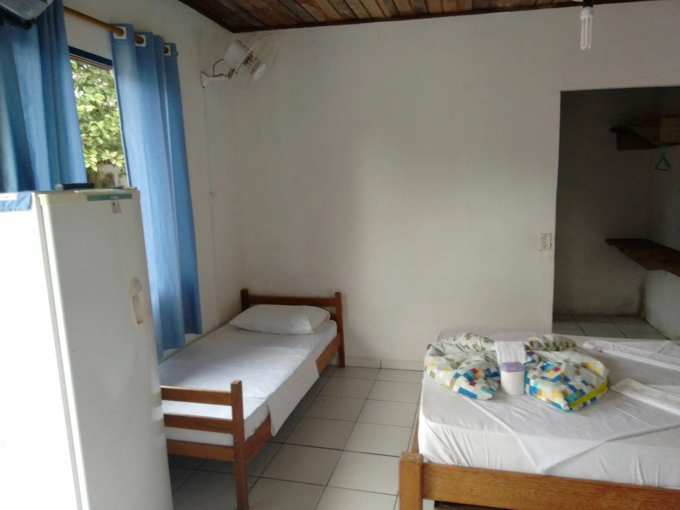 Bed in Pousada Edson