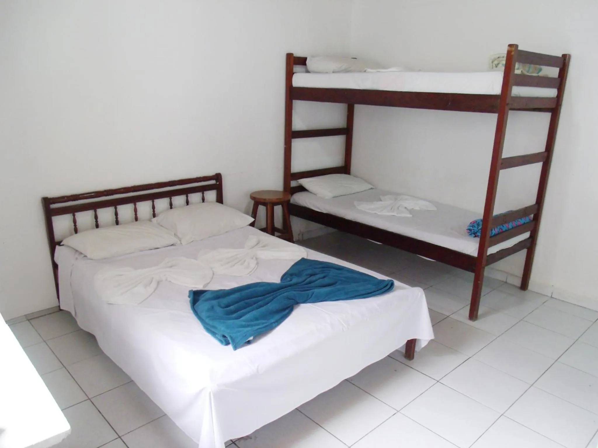 Bed in Pousada Edson