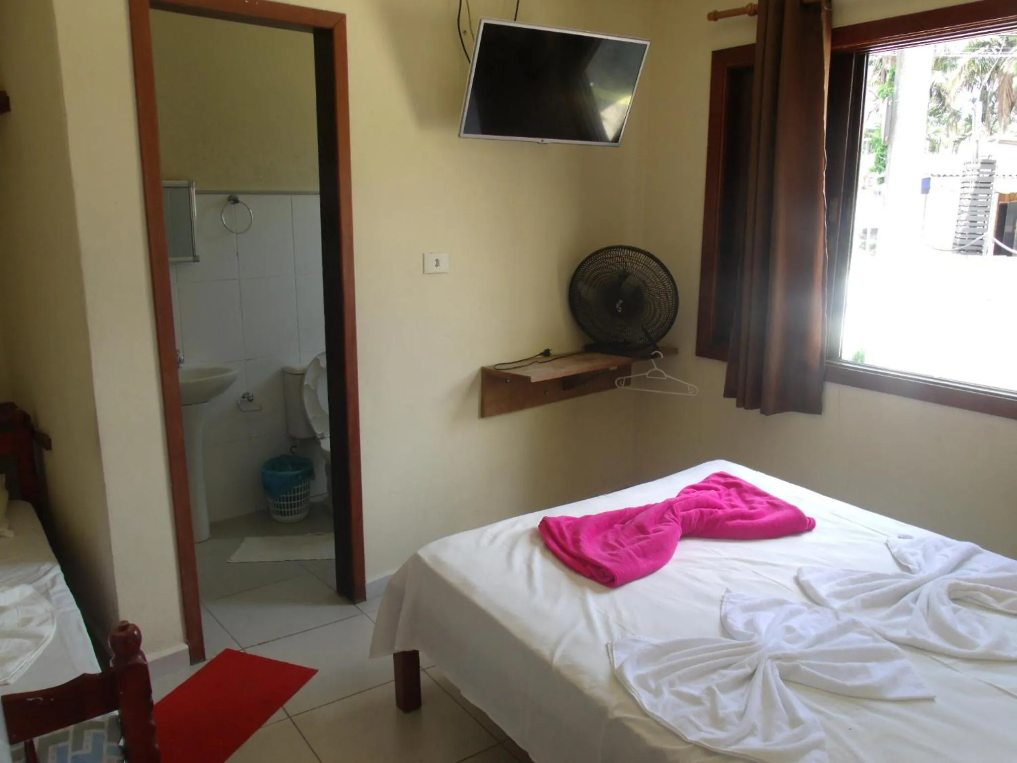 Bed in Pousada Edson