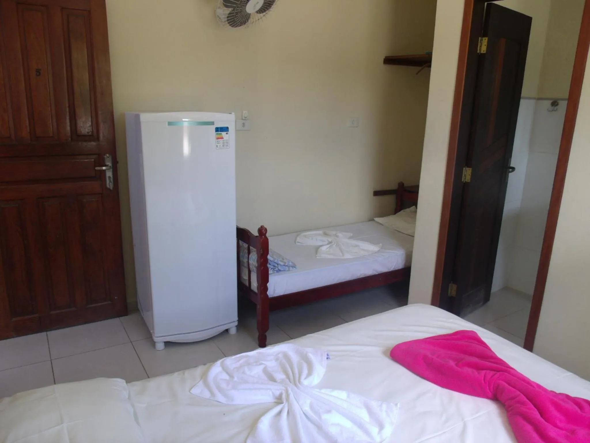 Bed in Pousada Edson