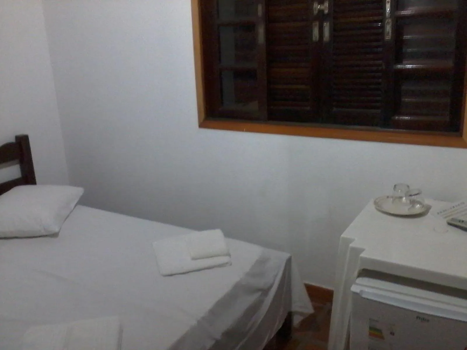 Bed in Pousada Edson