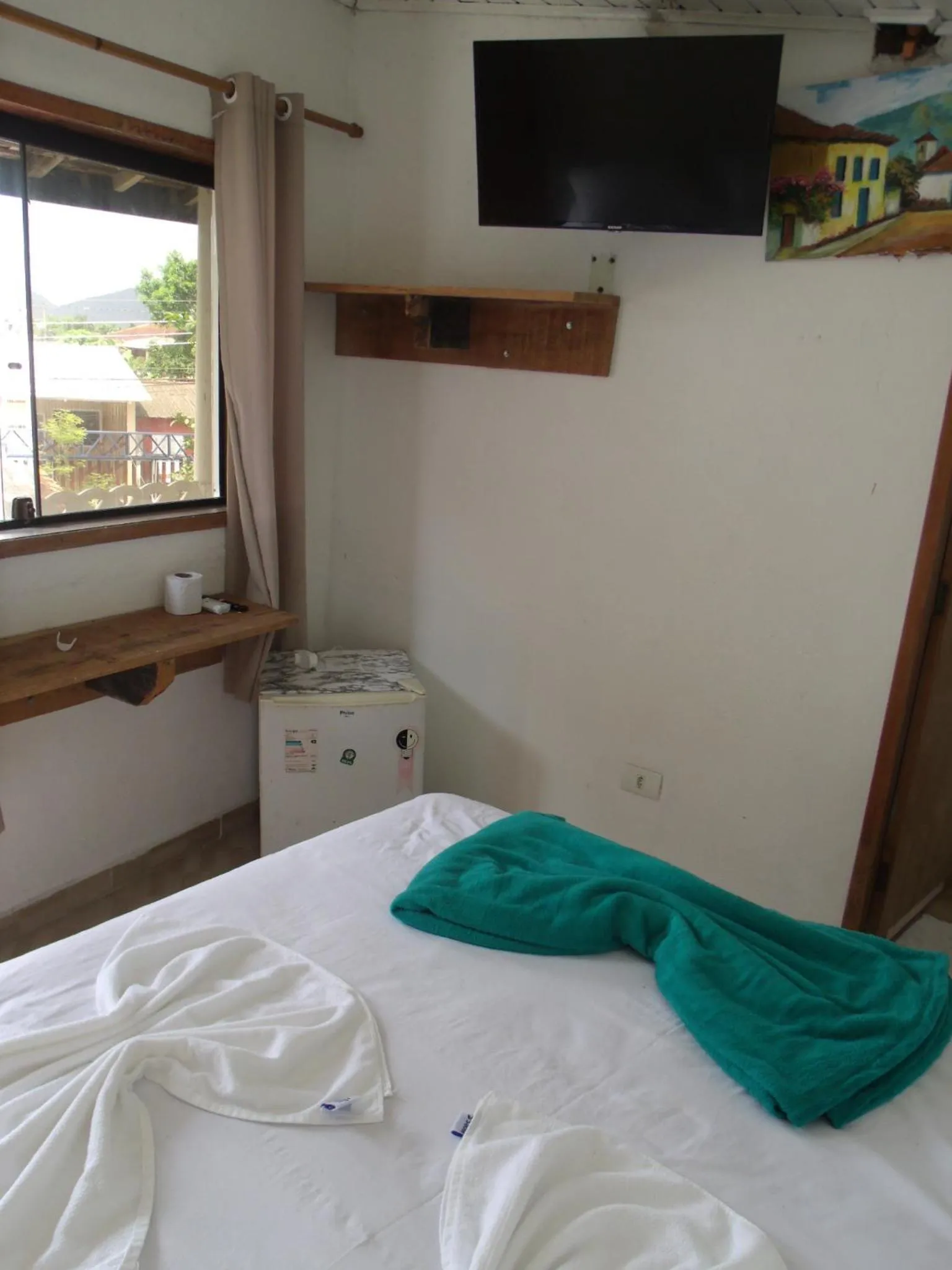 Bed in Pousada Edson