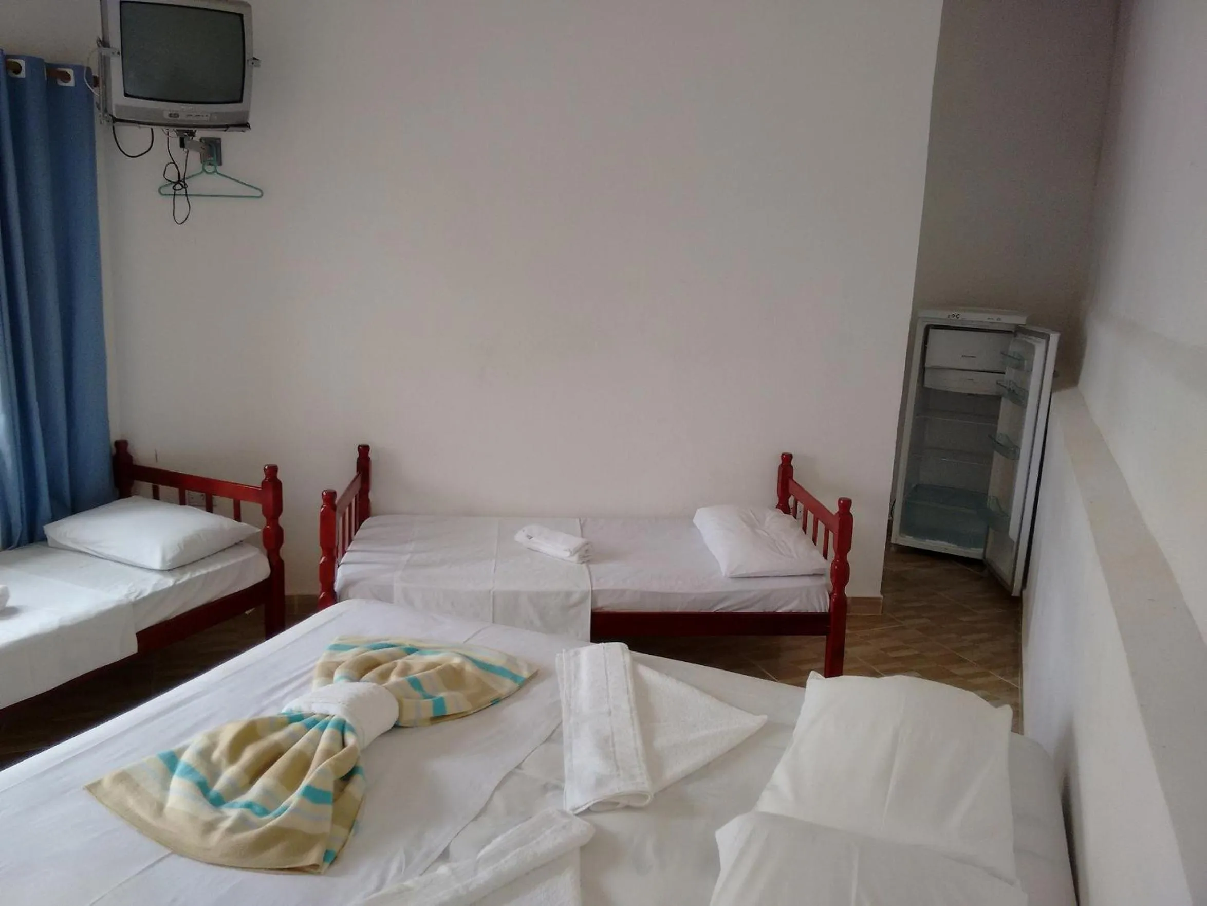 Bed in Pousada Edson