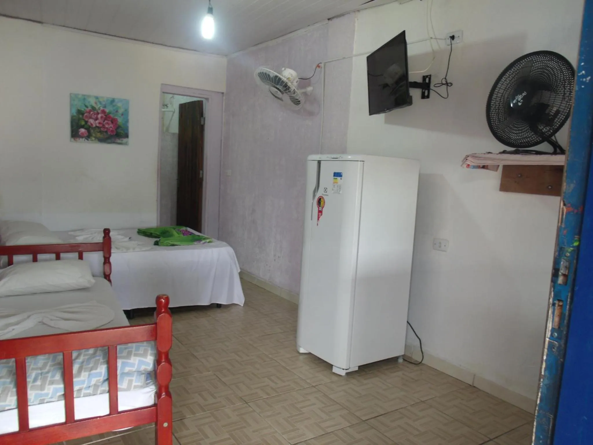 Bed in Pousada Edson