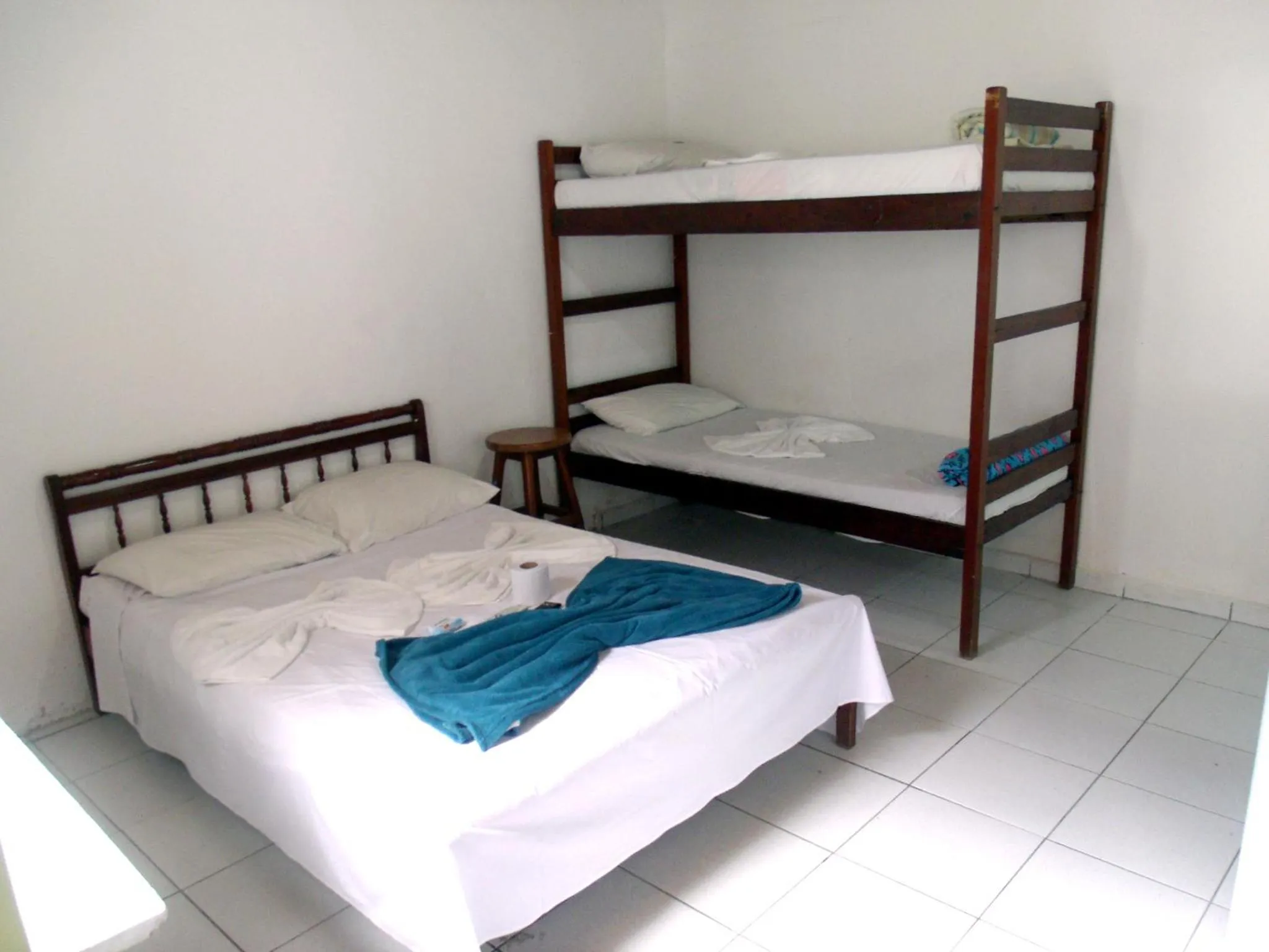 Bed in Pousada Edson