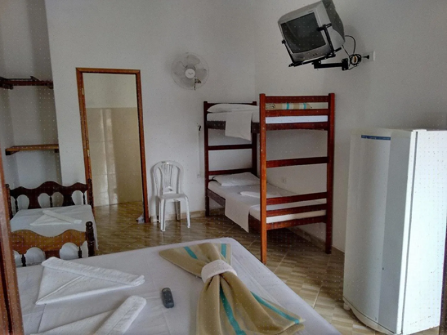 Bed in Pousada Edson