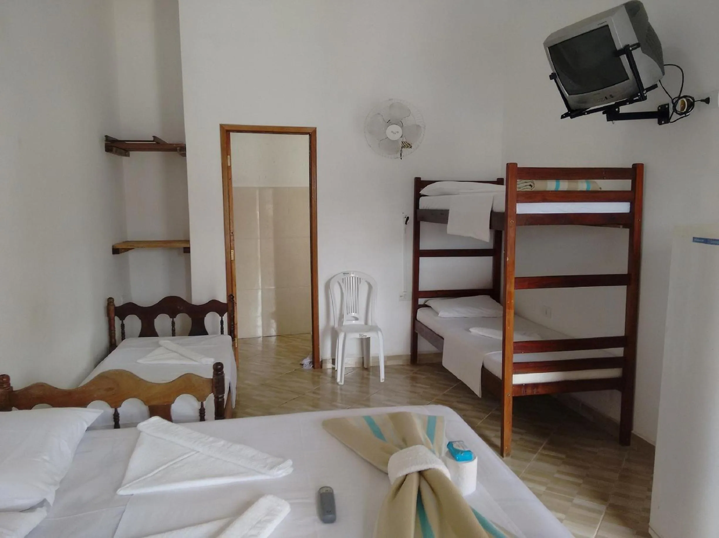 Bed in Pousada Edson